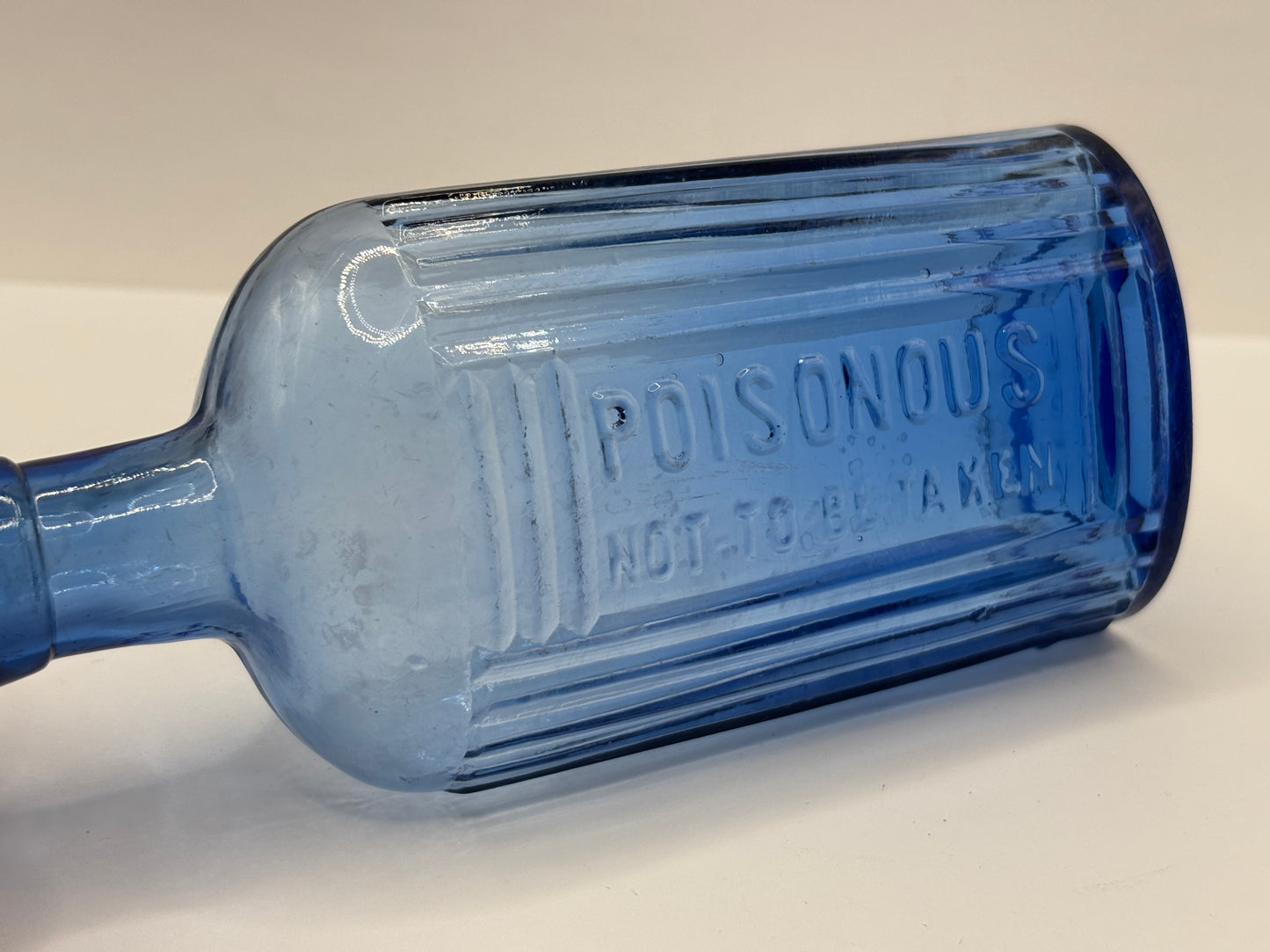 Old blue glass Poison bottle, Poisonous not to be taken