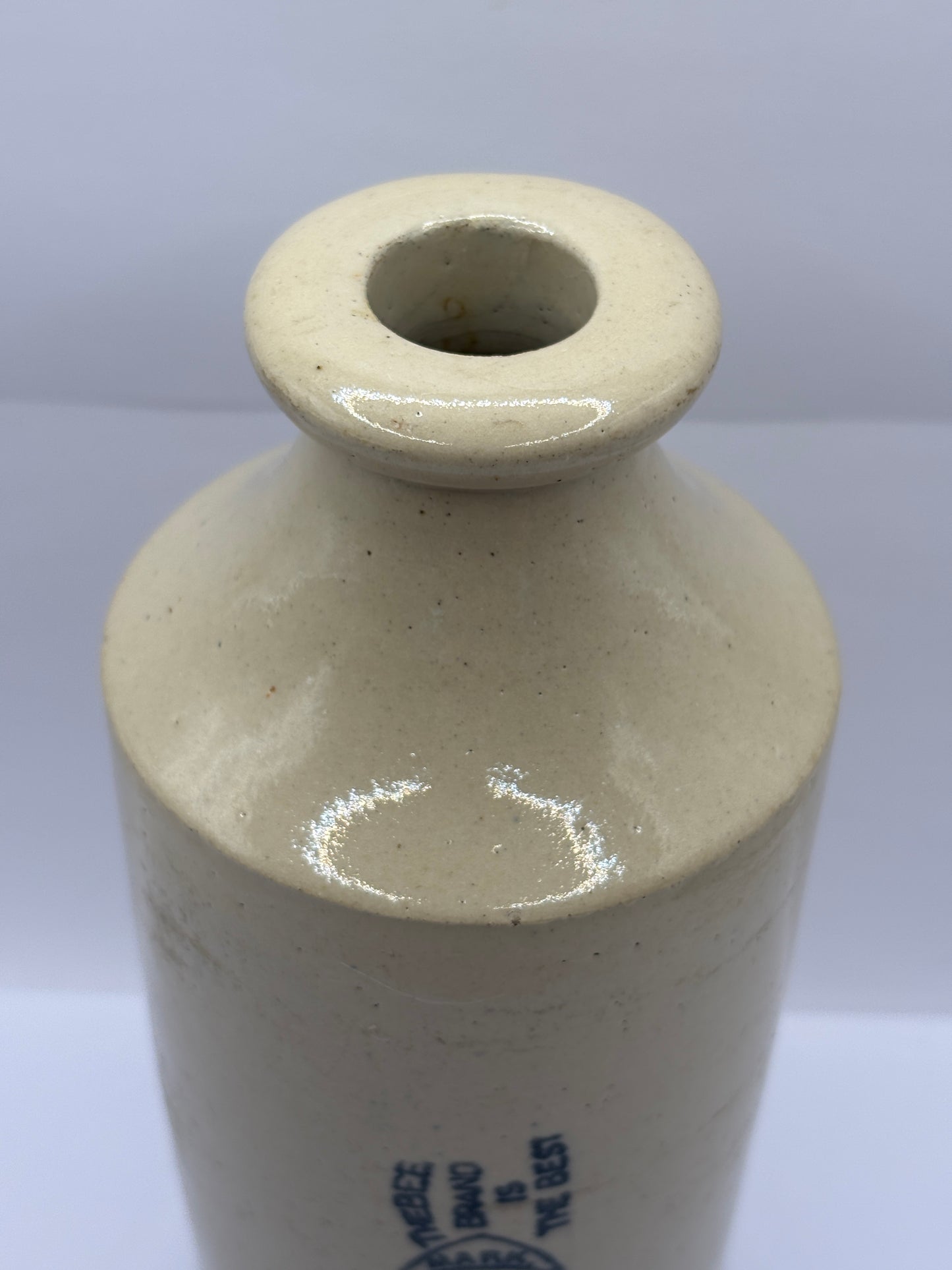 Old large advertising stoneware bottle. Bee brand