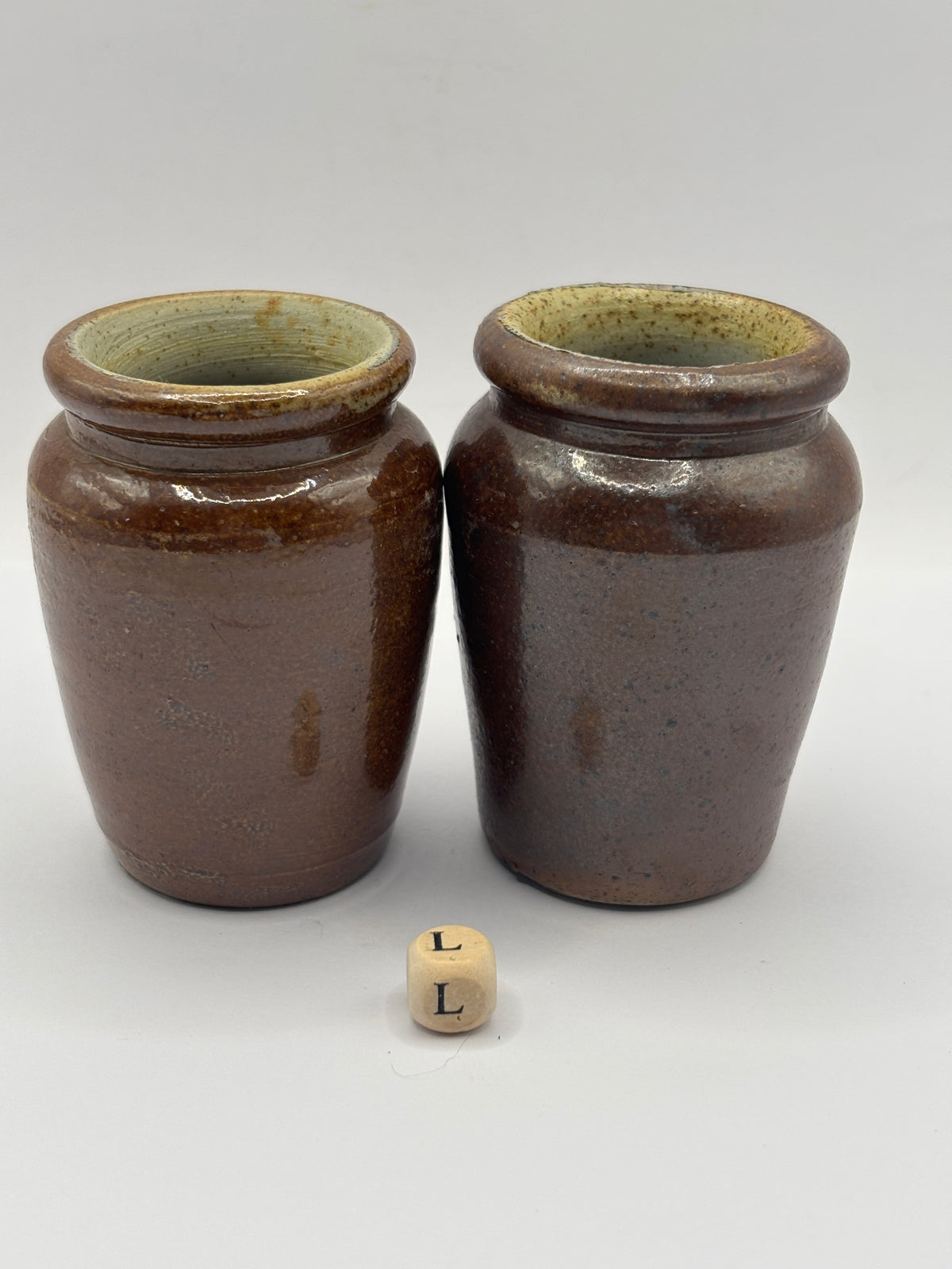 2 Old brown stoneware cream pots (L)