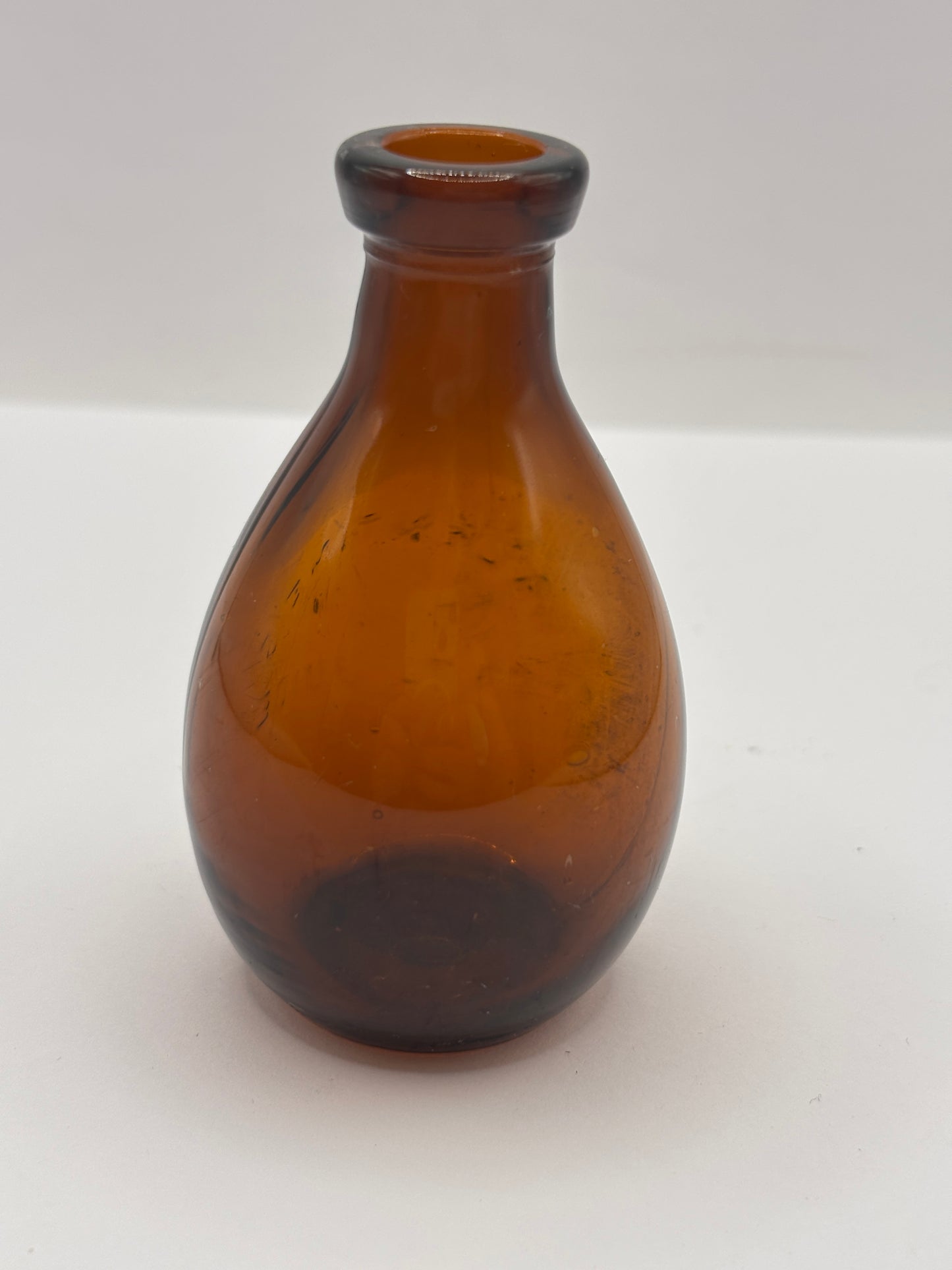 Old amber glass bottle, valentines meat juice