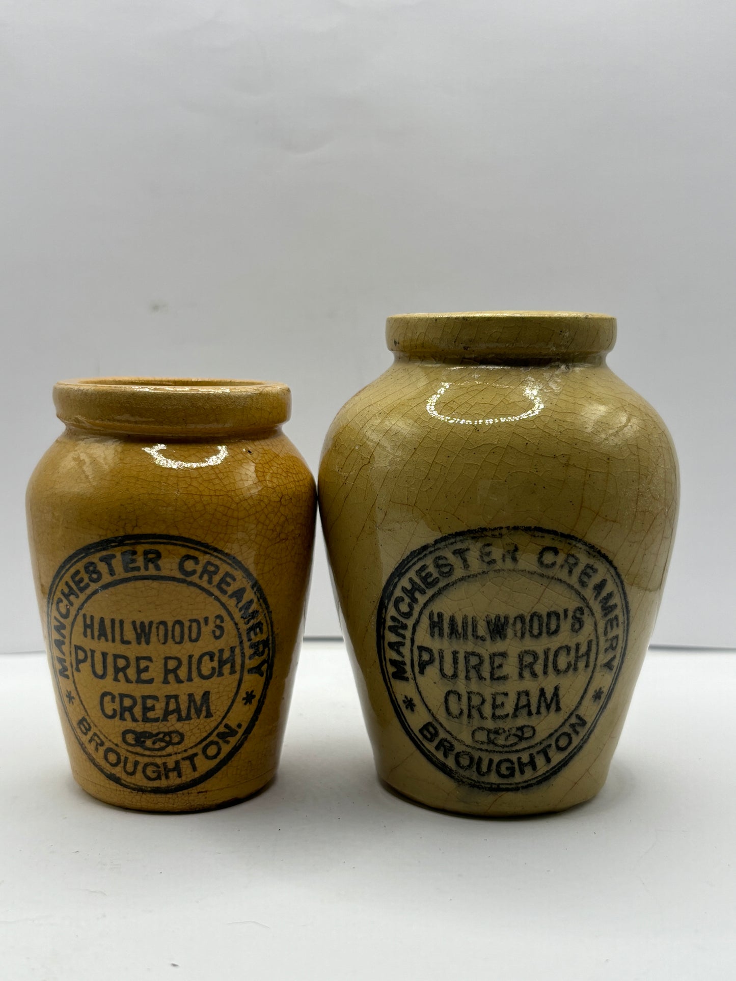 2 advertising cream pots, Stained & crazed