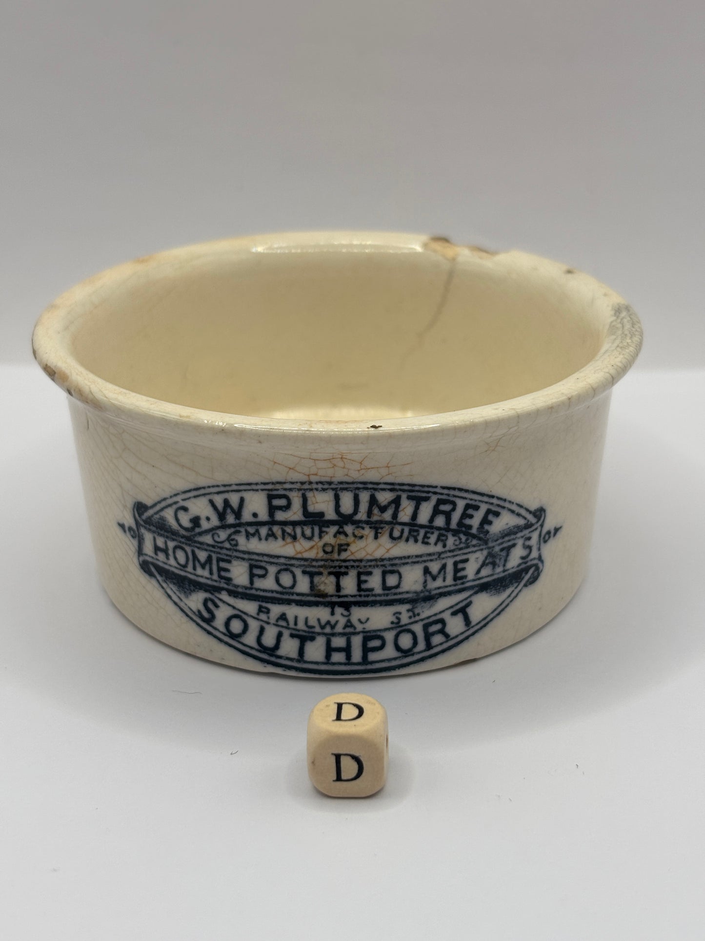 Old advertising meat paste pot, plumtrees (D) damaged