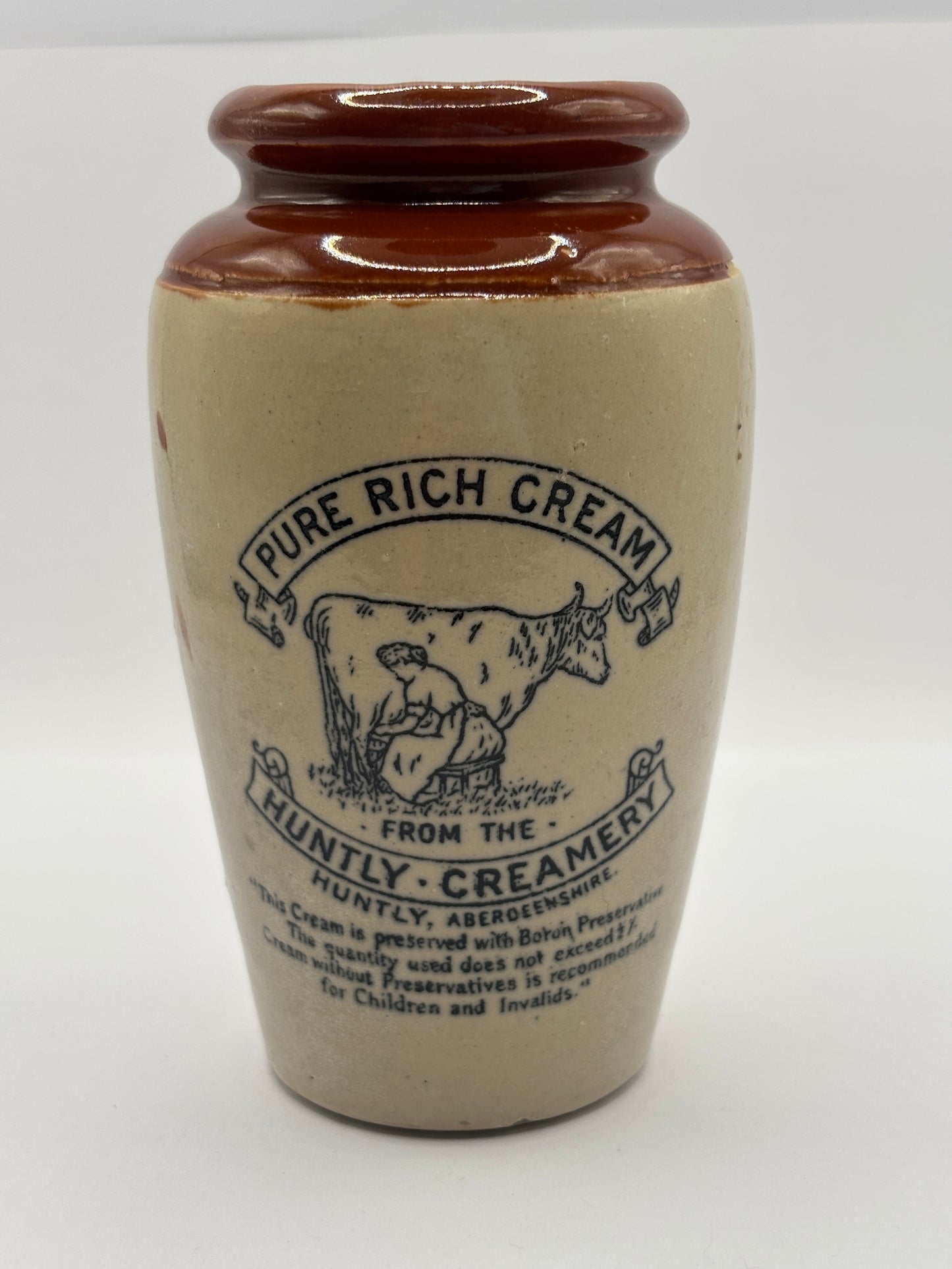 Old advertising cream pot, Huntly creamery. Milk maid. Pure rich cream