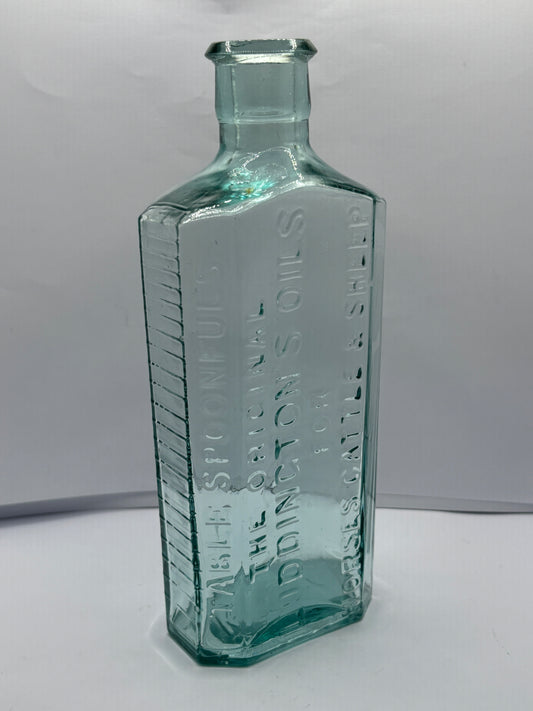 Old aqua glass vets bottle, luddingtons oils for horses cattle & sheep