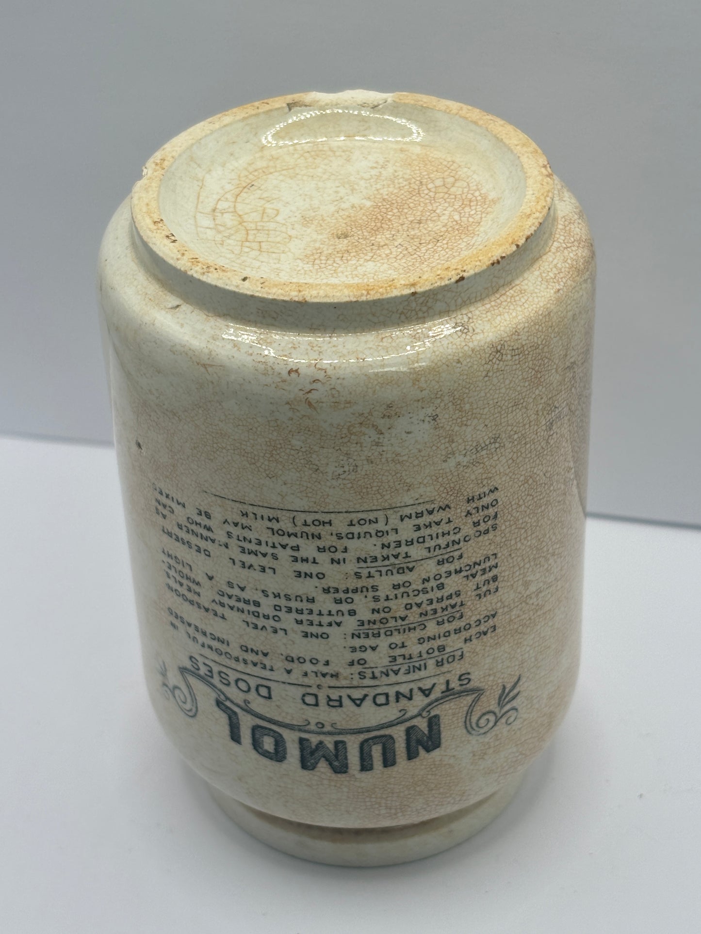 Early numol advertising jar