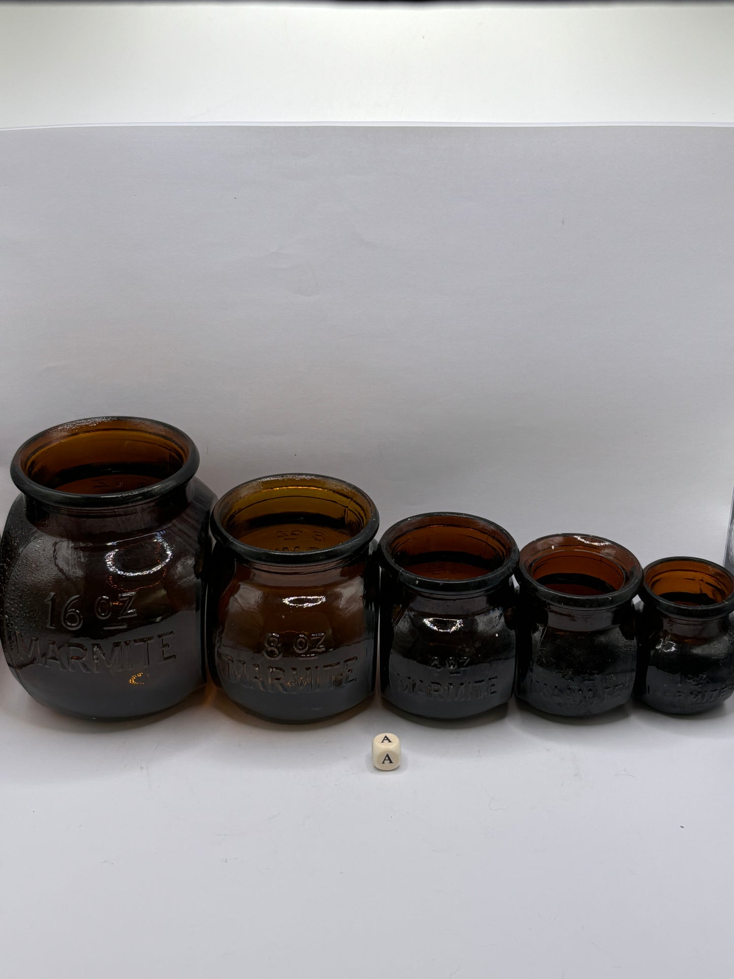 5 old amber glass marmite jars (a)