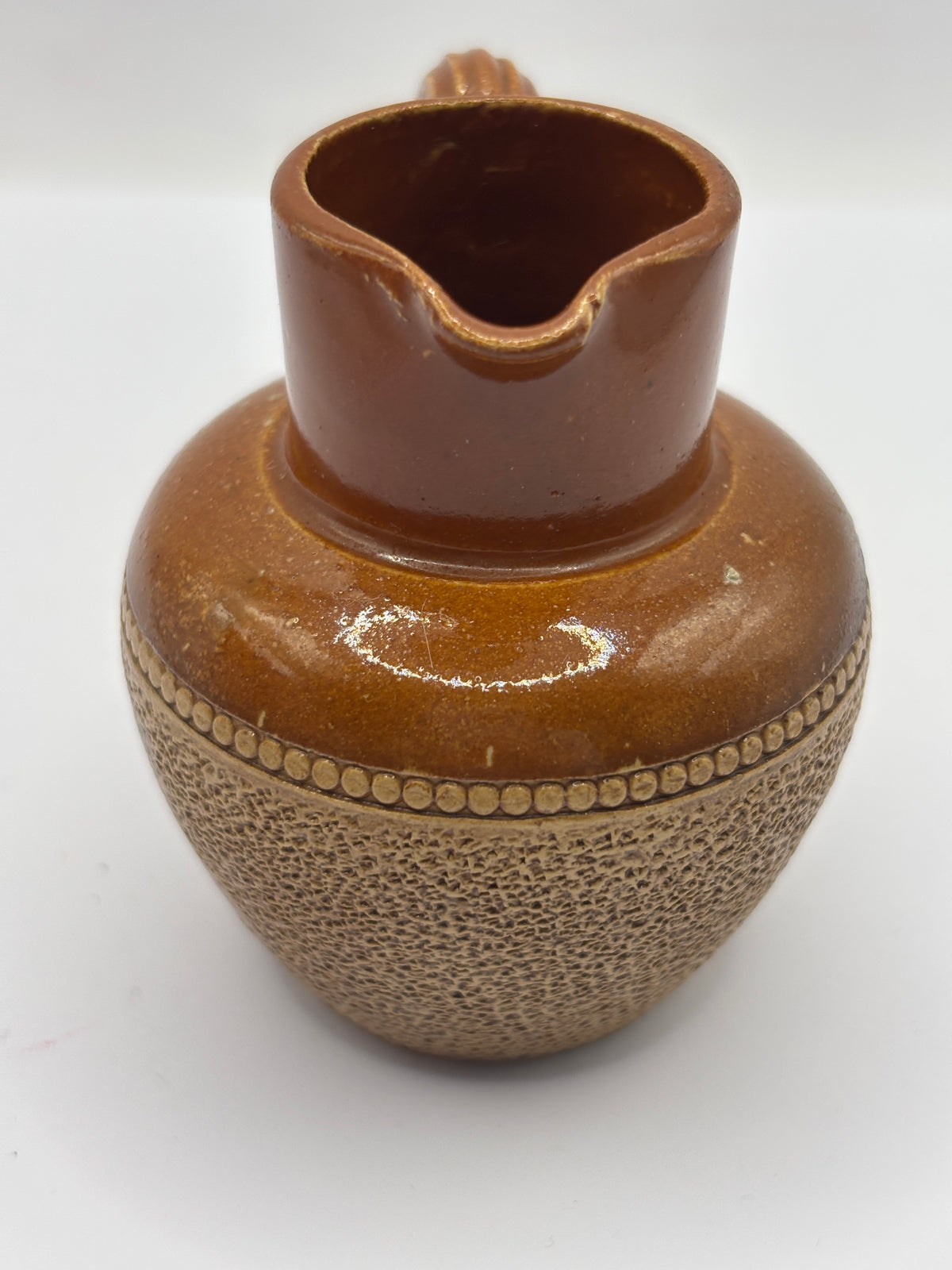 Old mini stoneware handled jug