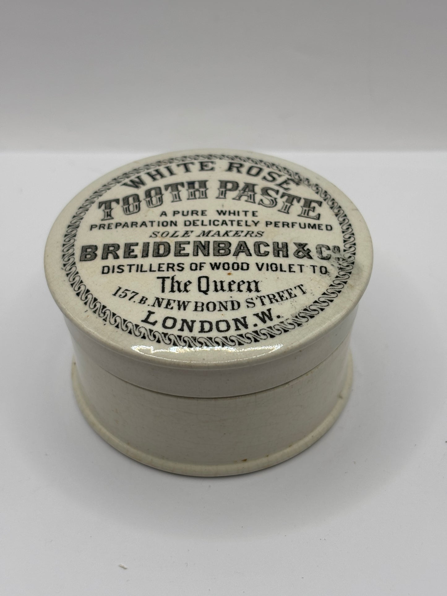 Old advertising lid and base, White Rose Tooth Paste