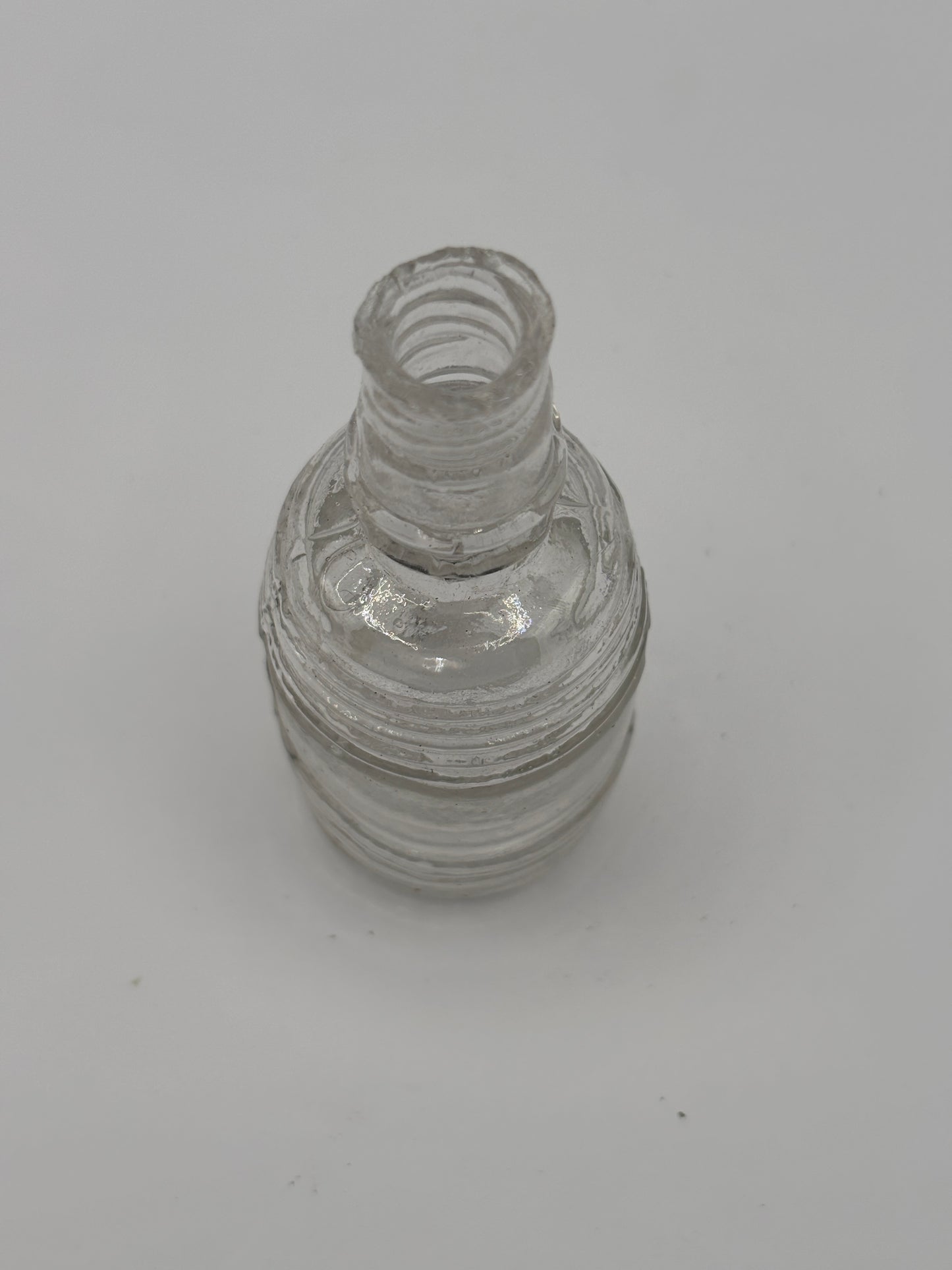 Old clear glass barrel ink bottle, inkwell