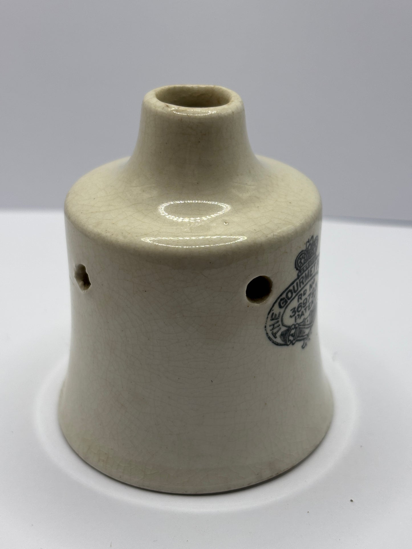 Old stoneware advertising gourmet pie cup