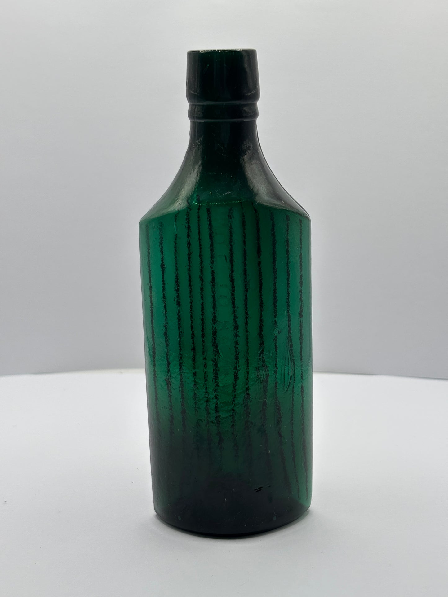 Old green glass poison bottle, not to be taken
