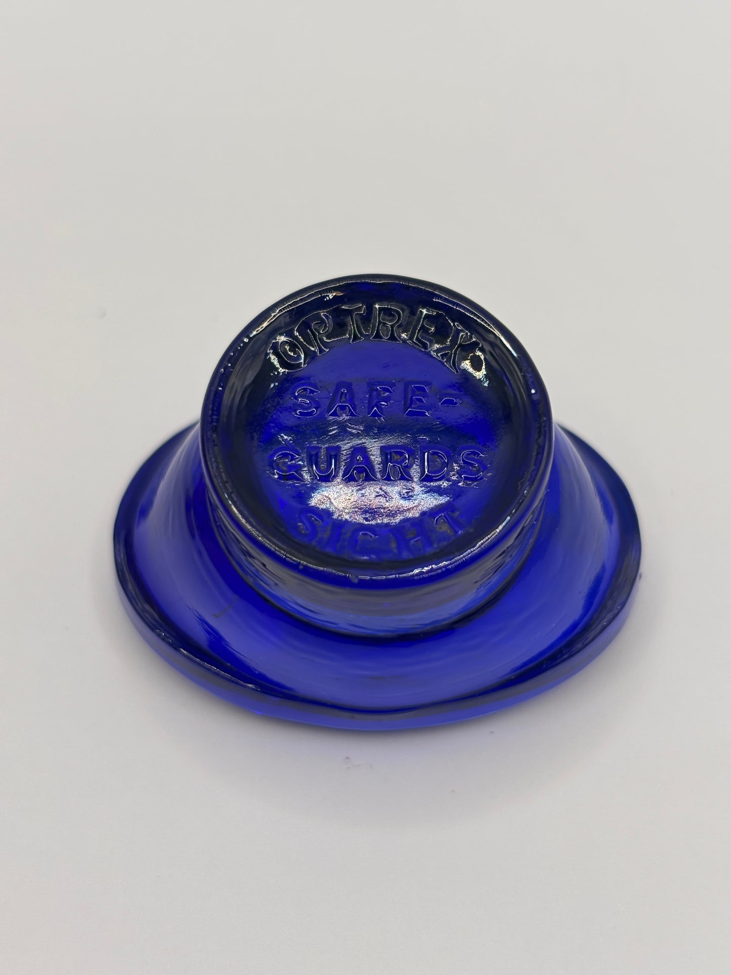 Old blue glass eye bath, eye wash