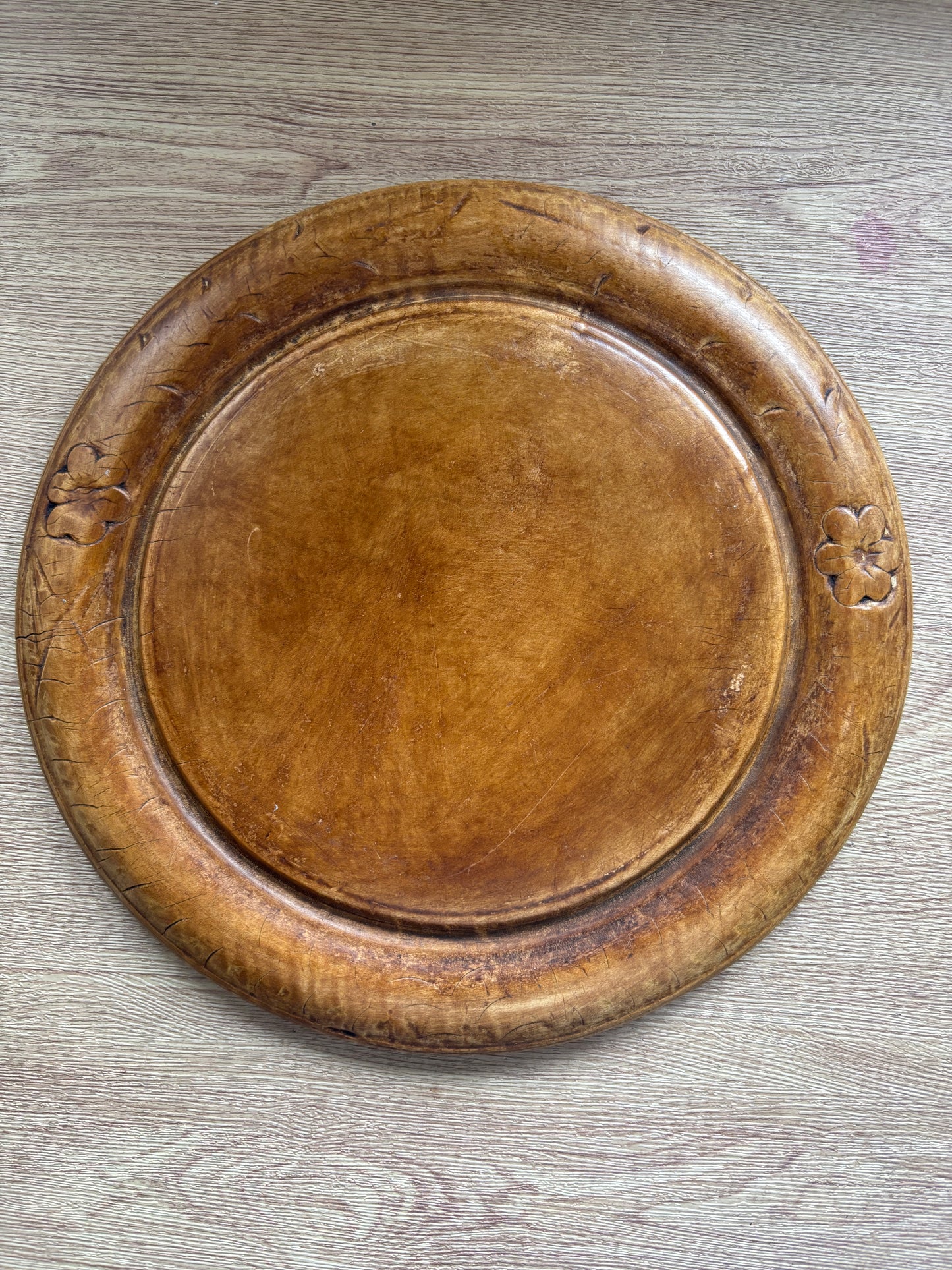 Old wooden carved bread board
