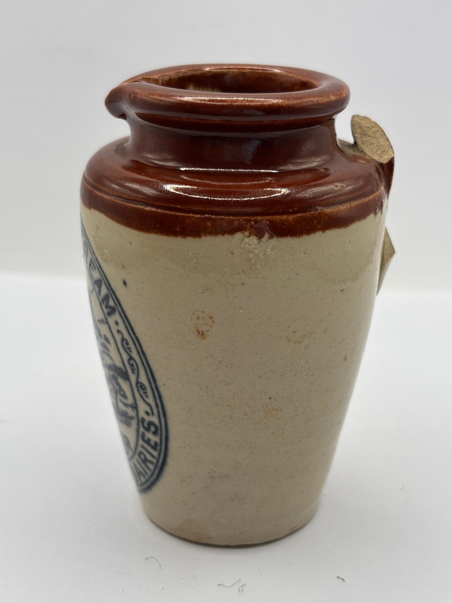 Old advertising cream pot, Bannisters Huddersfield. Damaged