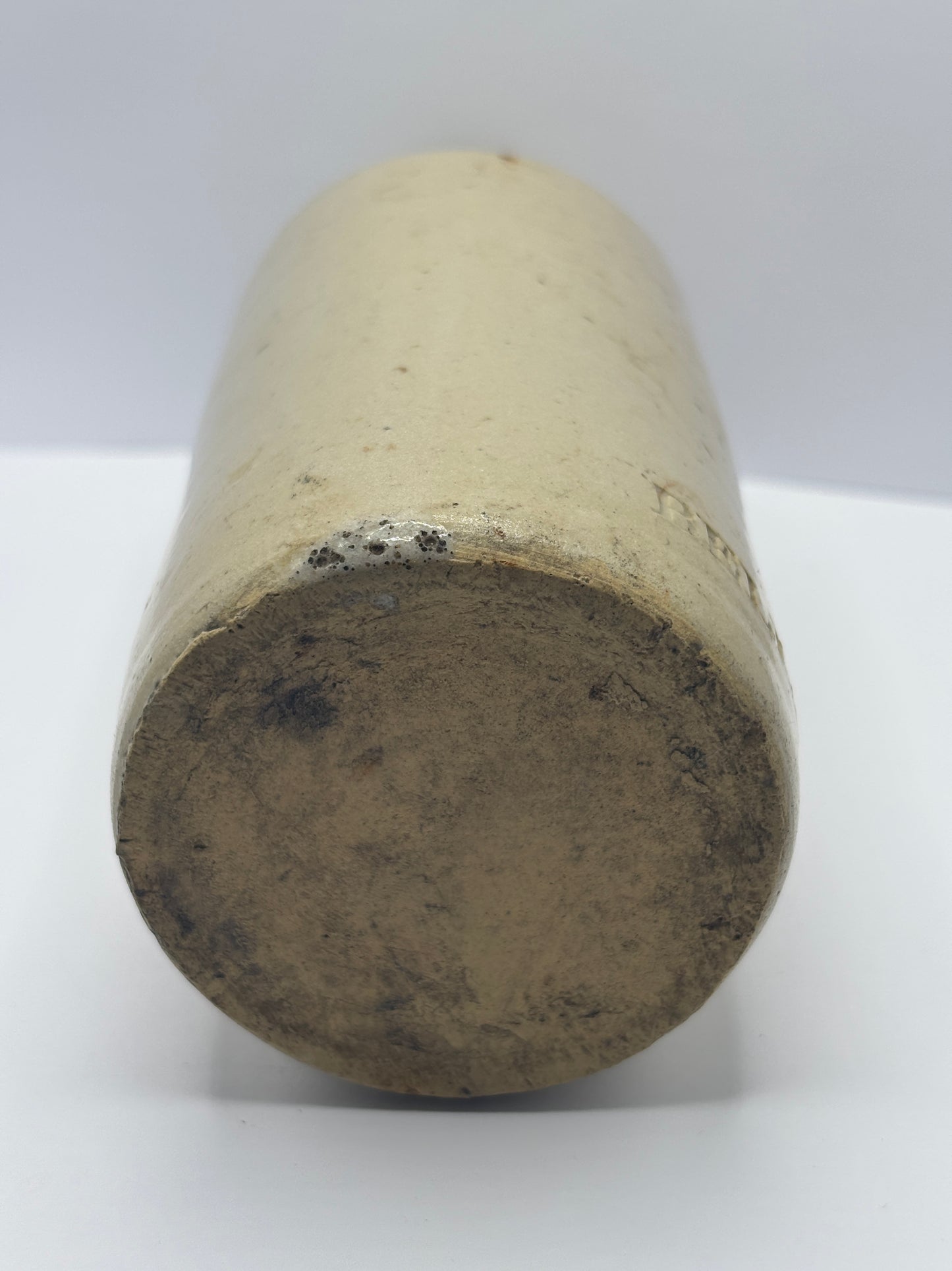 Old white stoneware Belle vue ginger beer bottle