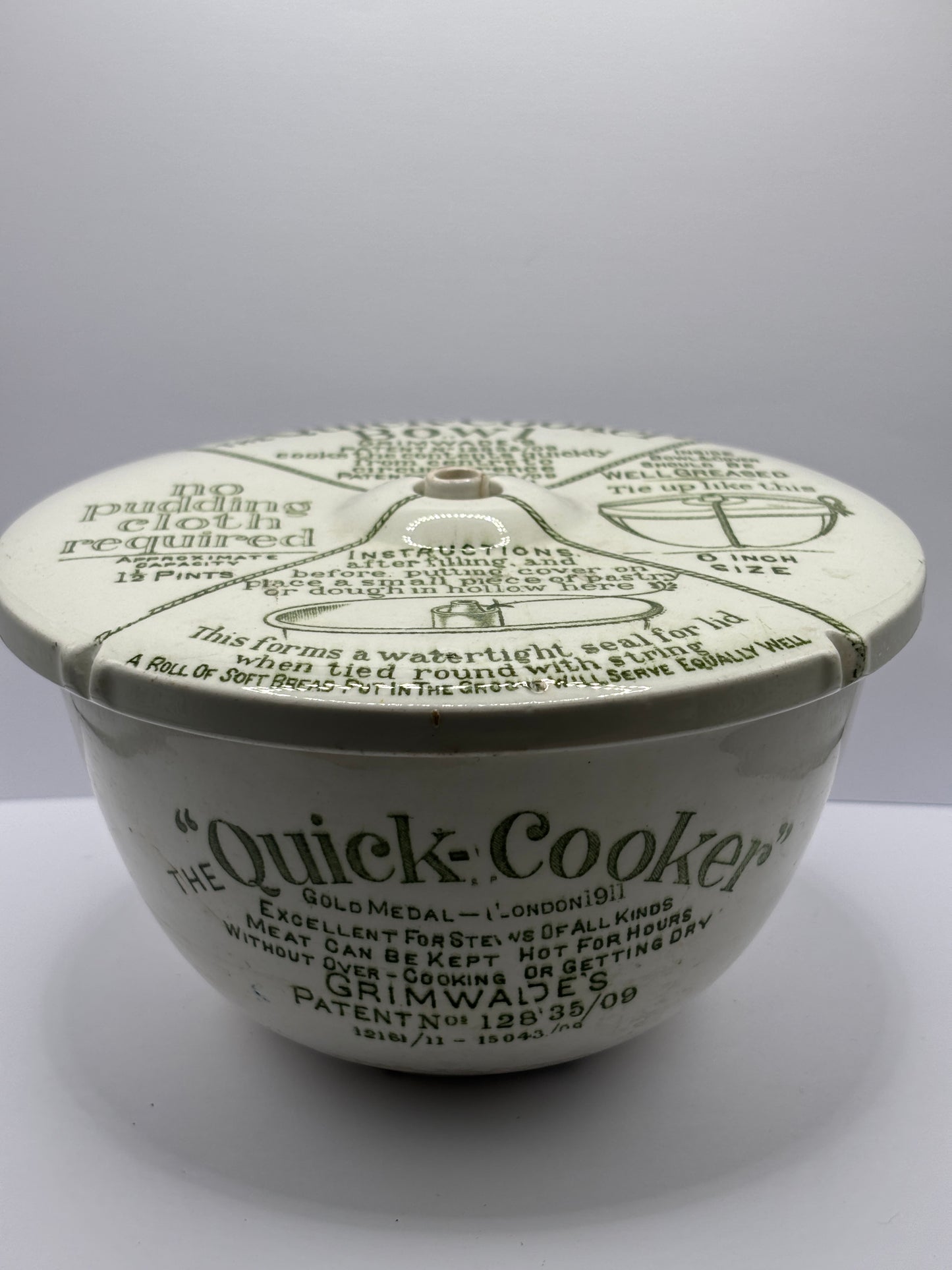 Old stoneware advertising quick cooker