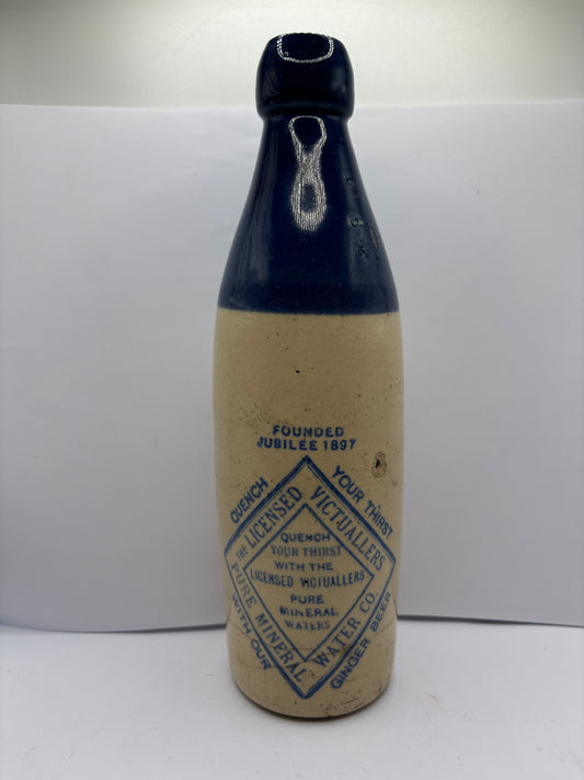 Old blue top ginger beer bottle