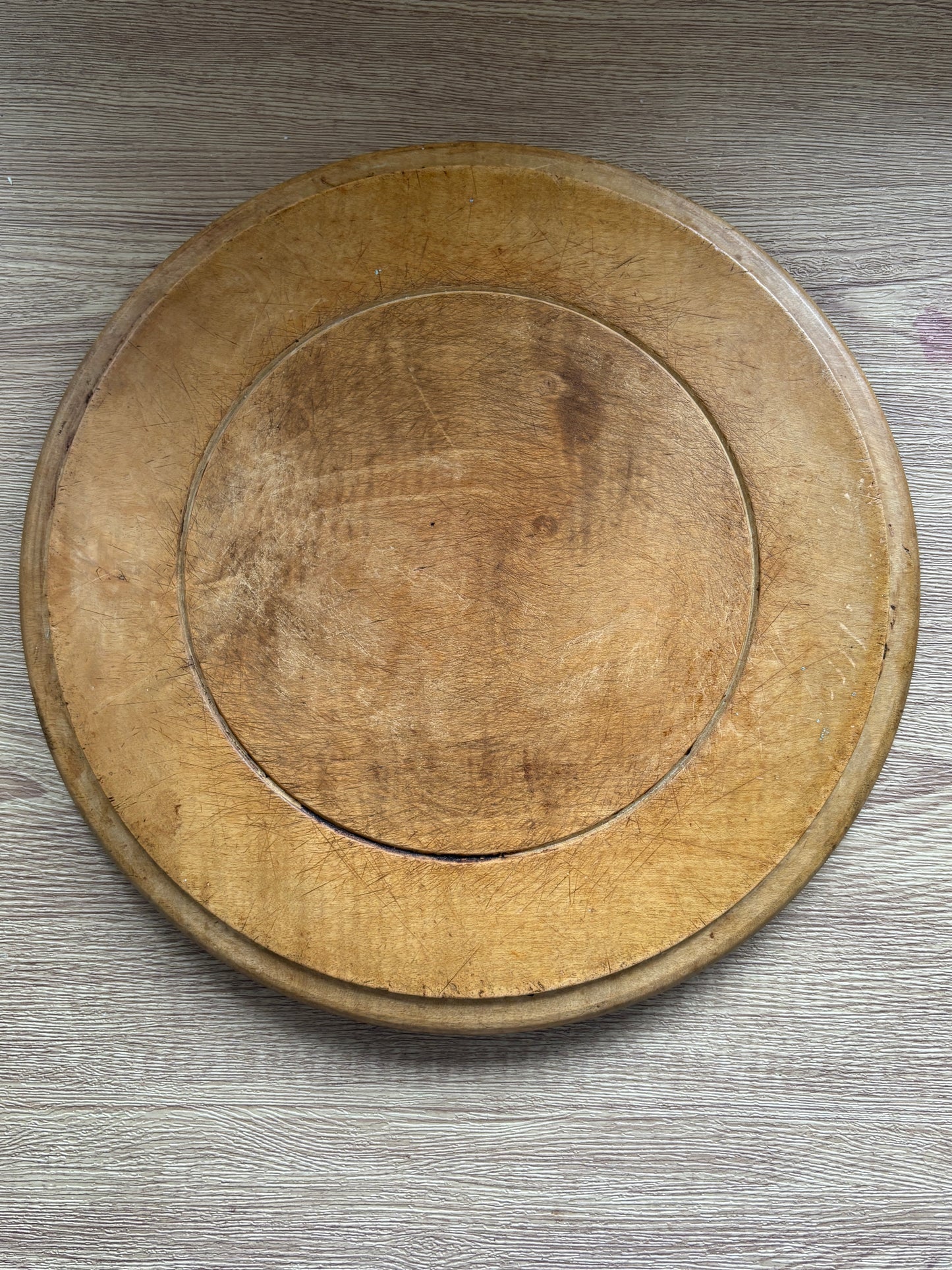 Old wooden carved bread board