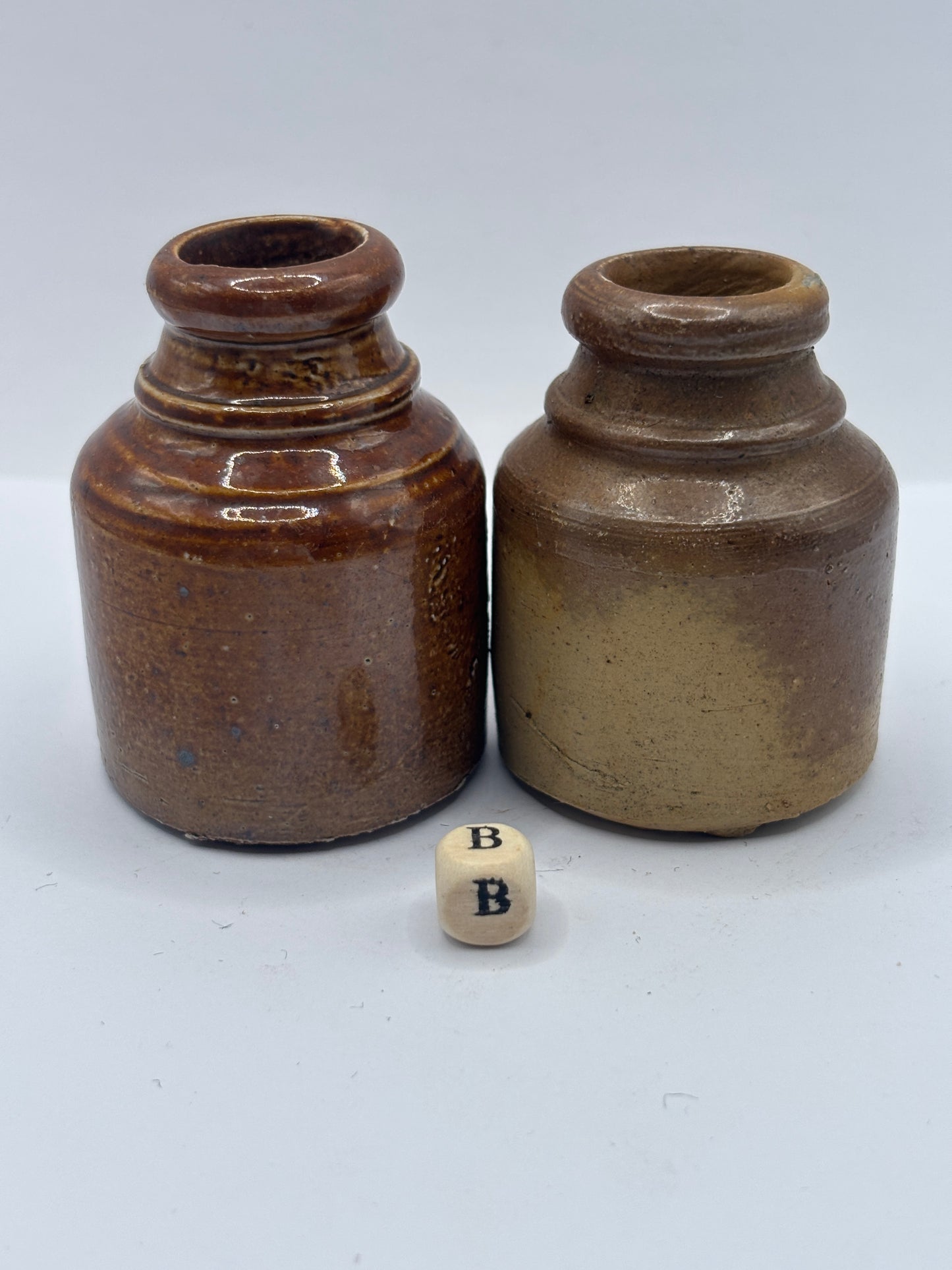 2 brown stoneware inkwells, ink bottles (B)