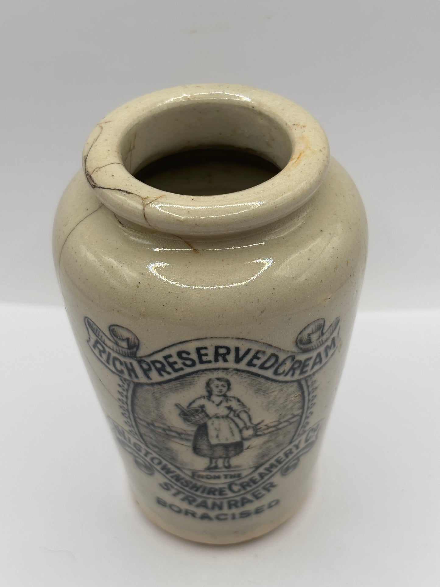 Old advertising cream pot, Rich preserved cream, Stranraer. Milk maid. damaged