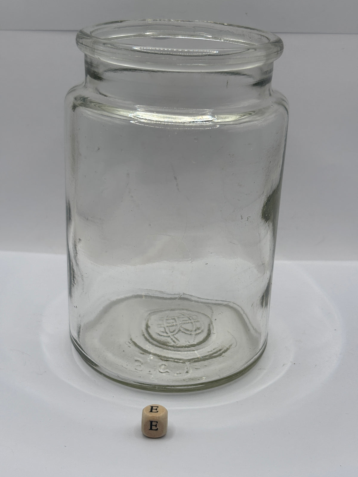 Old clear glass pickle jar (e)