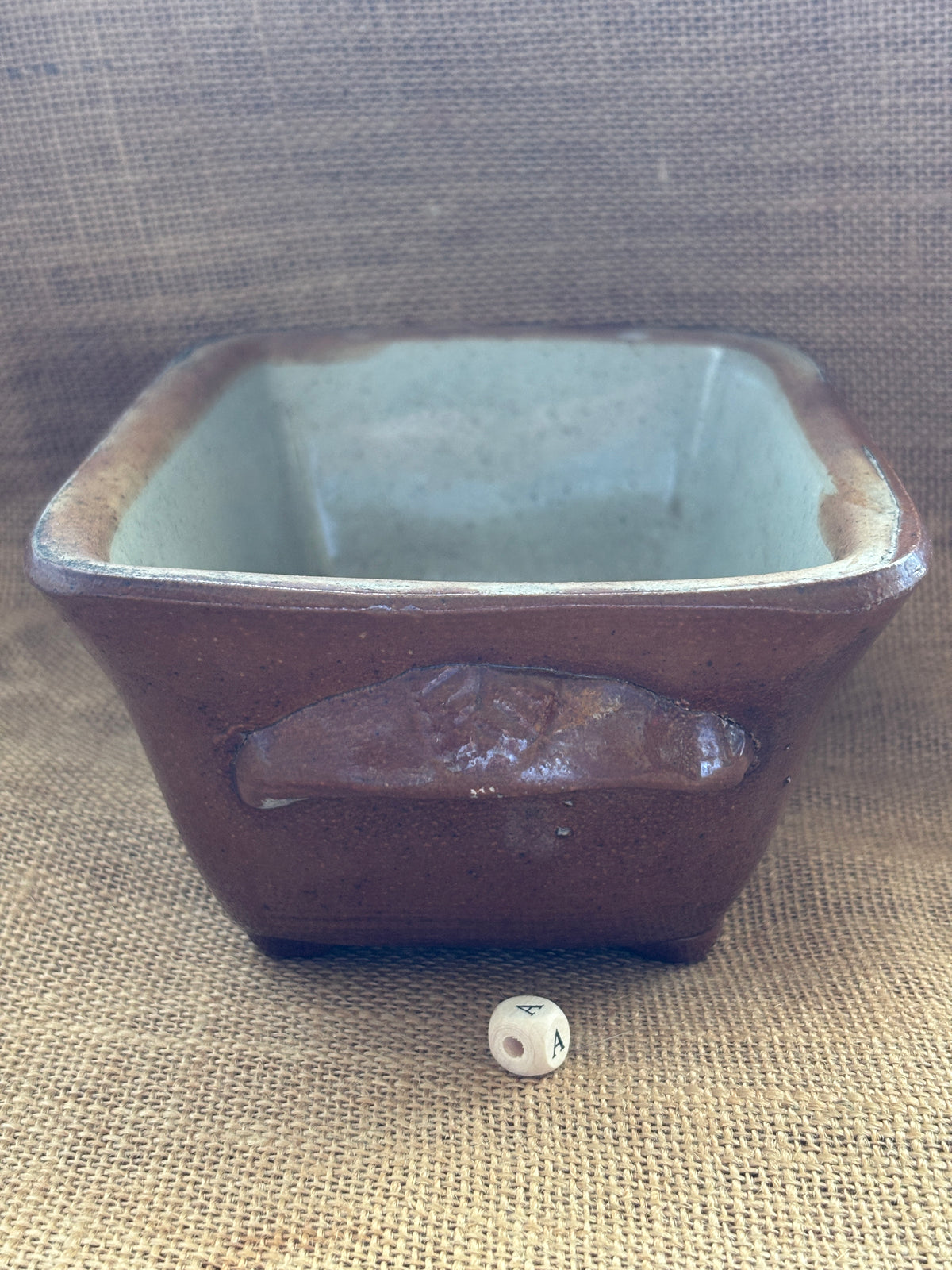 Old brown salt glaze stoneware pie dish (a)