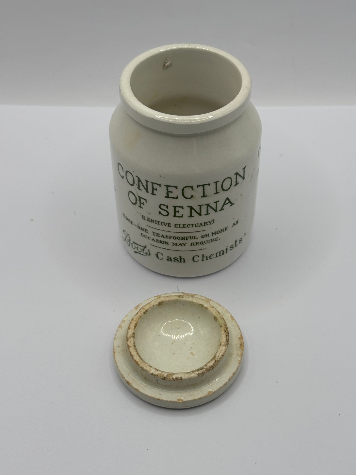 Old stoneware advertising jar and lid, Boots confection of senna