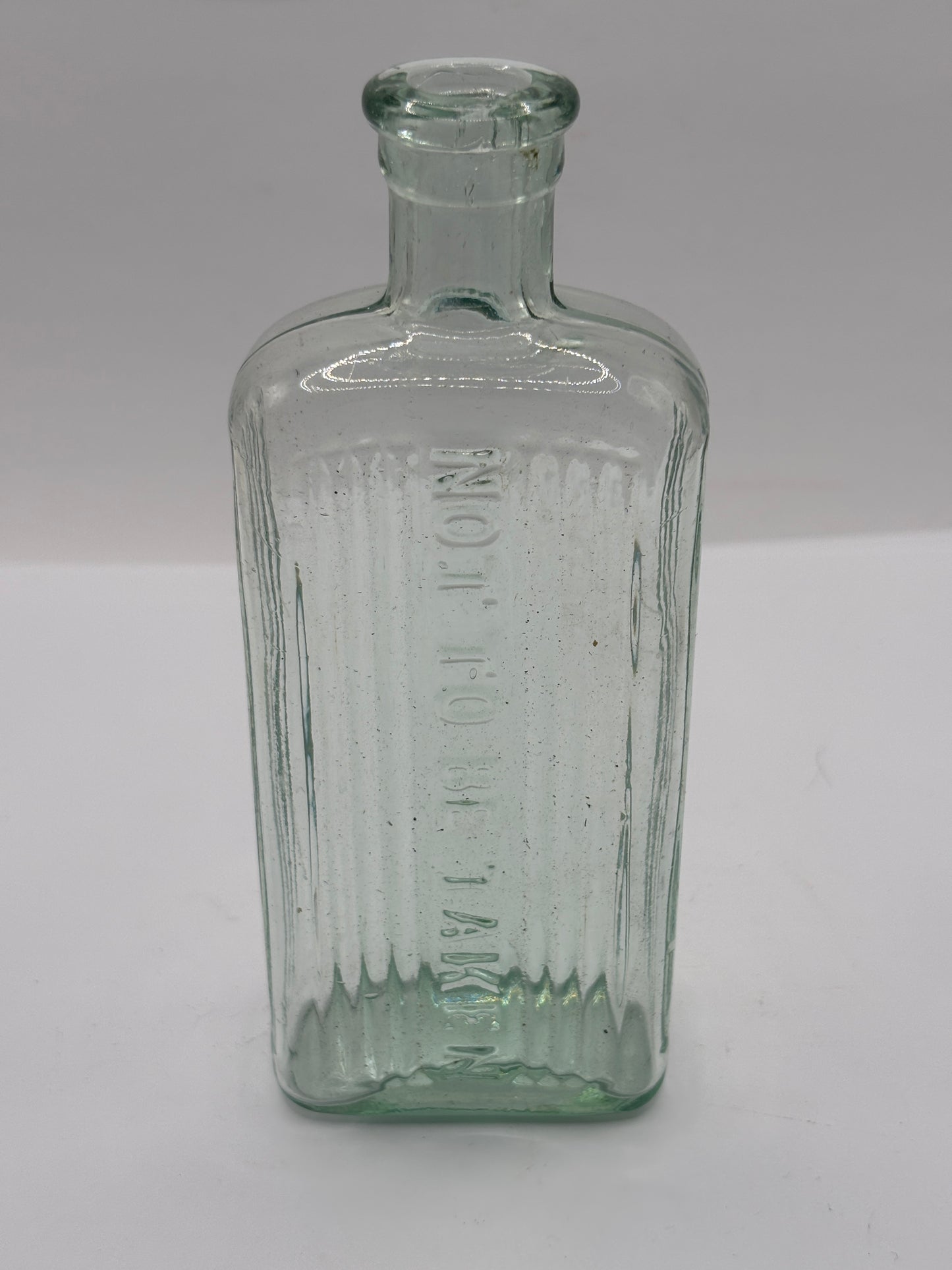 Old aqua glass poison bottle, not to be taken (Copy)