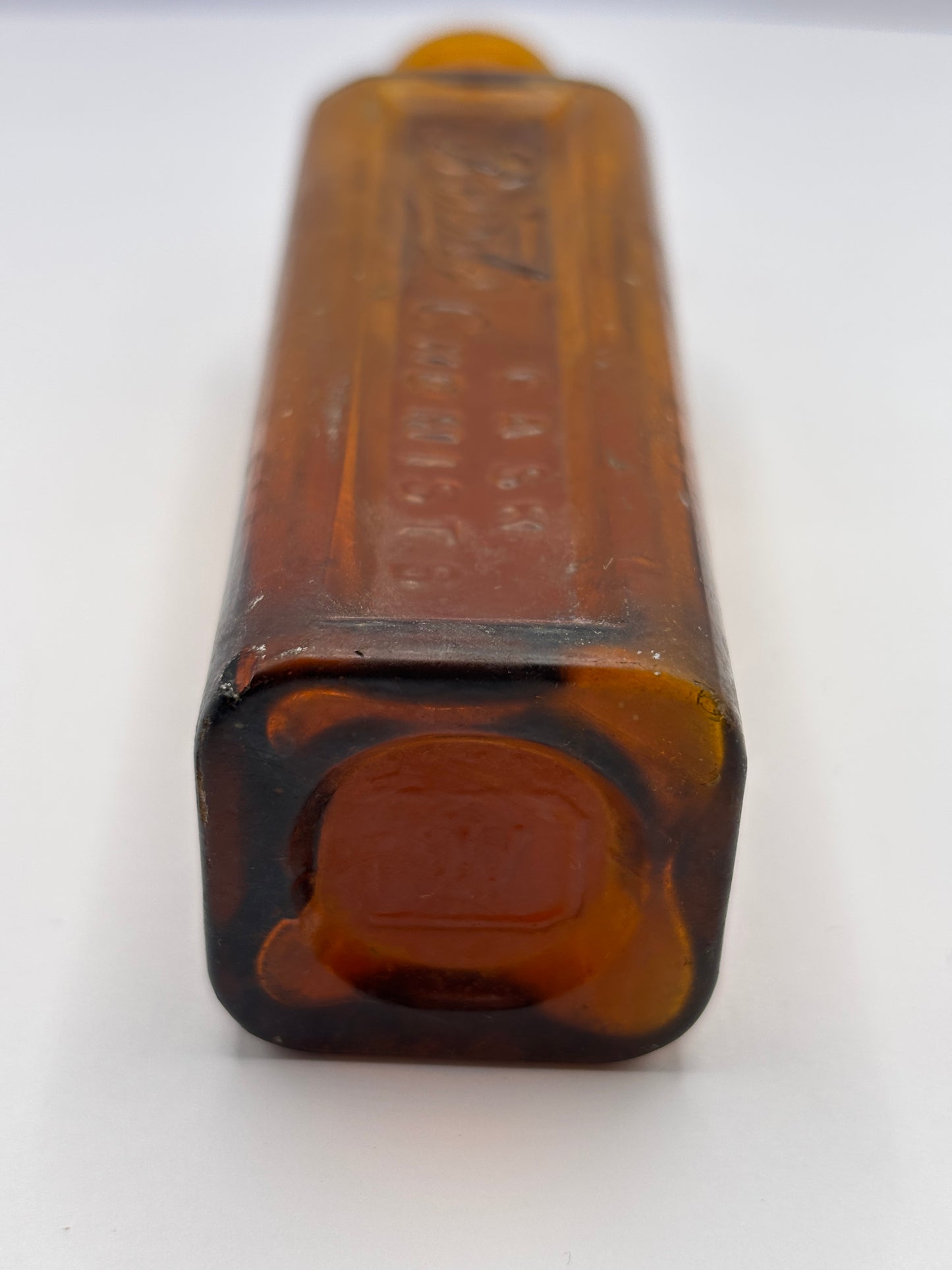 Old amber glass Boots cash chemists bottle