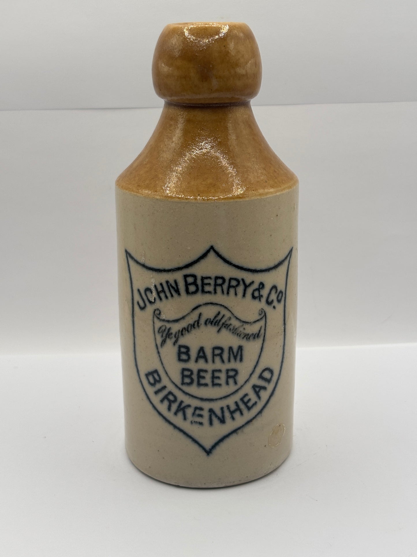 Old stoneware ginger beer bottle, John Berry & Co, Barn beer Birkenhead
