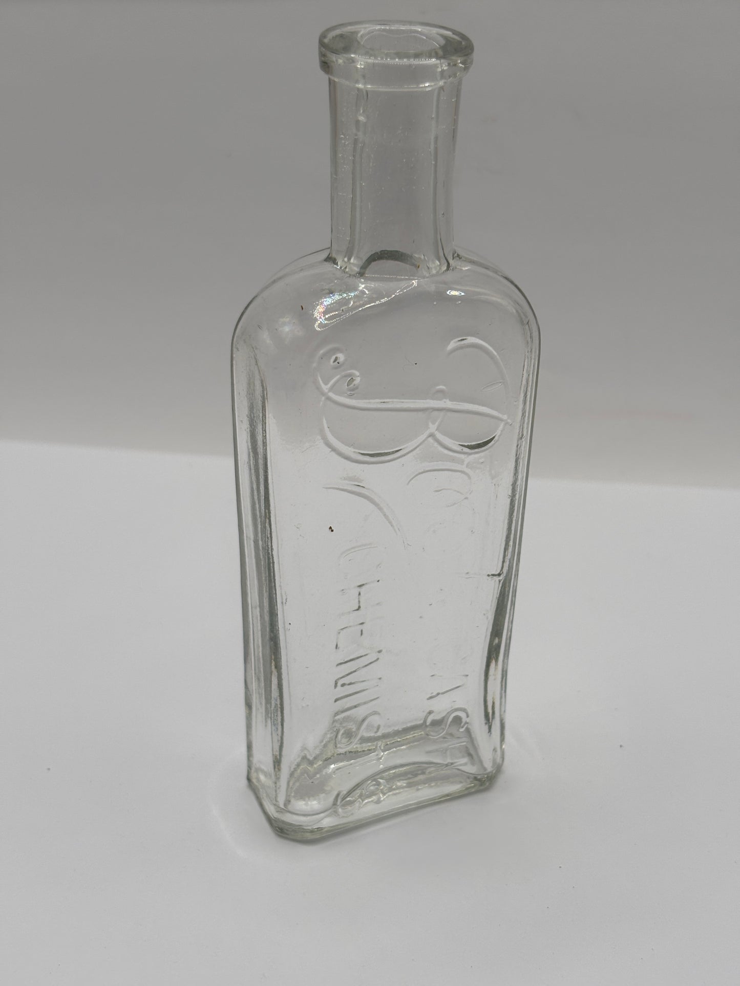 Old clear glass Boots cash chemists bottle