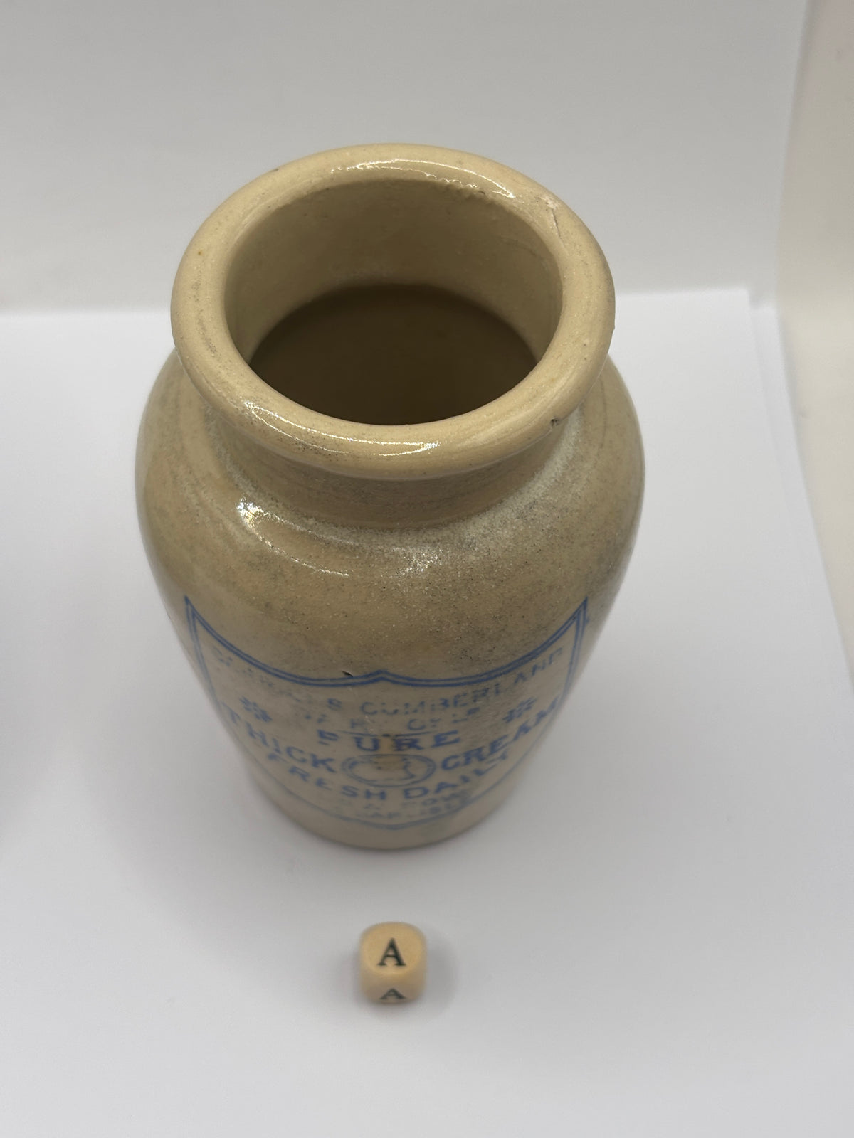 Old advertising cream pot, Carricks Cumberland dairy (a)