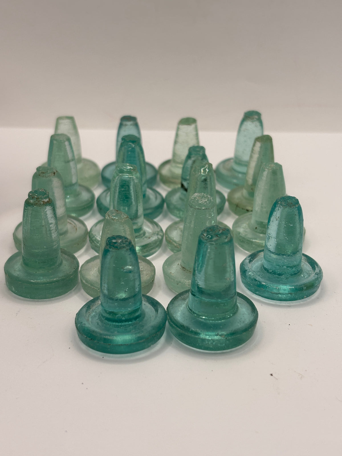 18 old glass bottle stoppers
