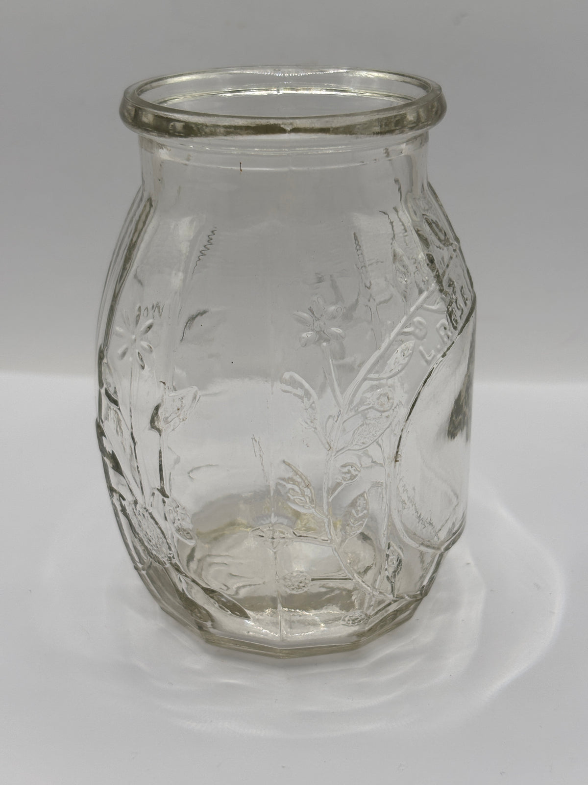 Old clear glass Roses marmalade jar