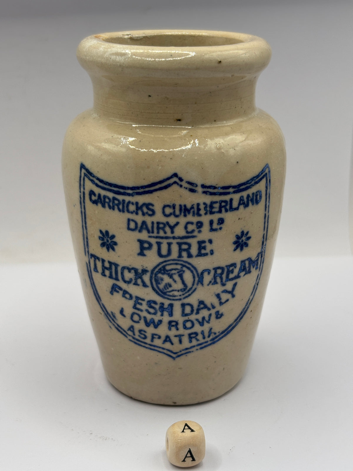 Old advertising cream pot, Carricks Cumberland dairy (a)