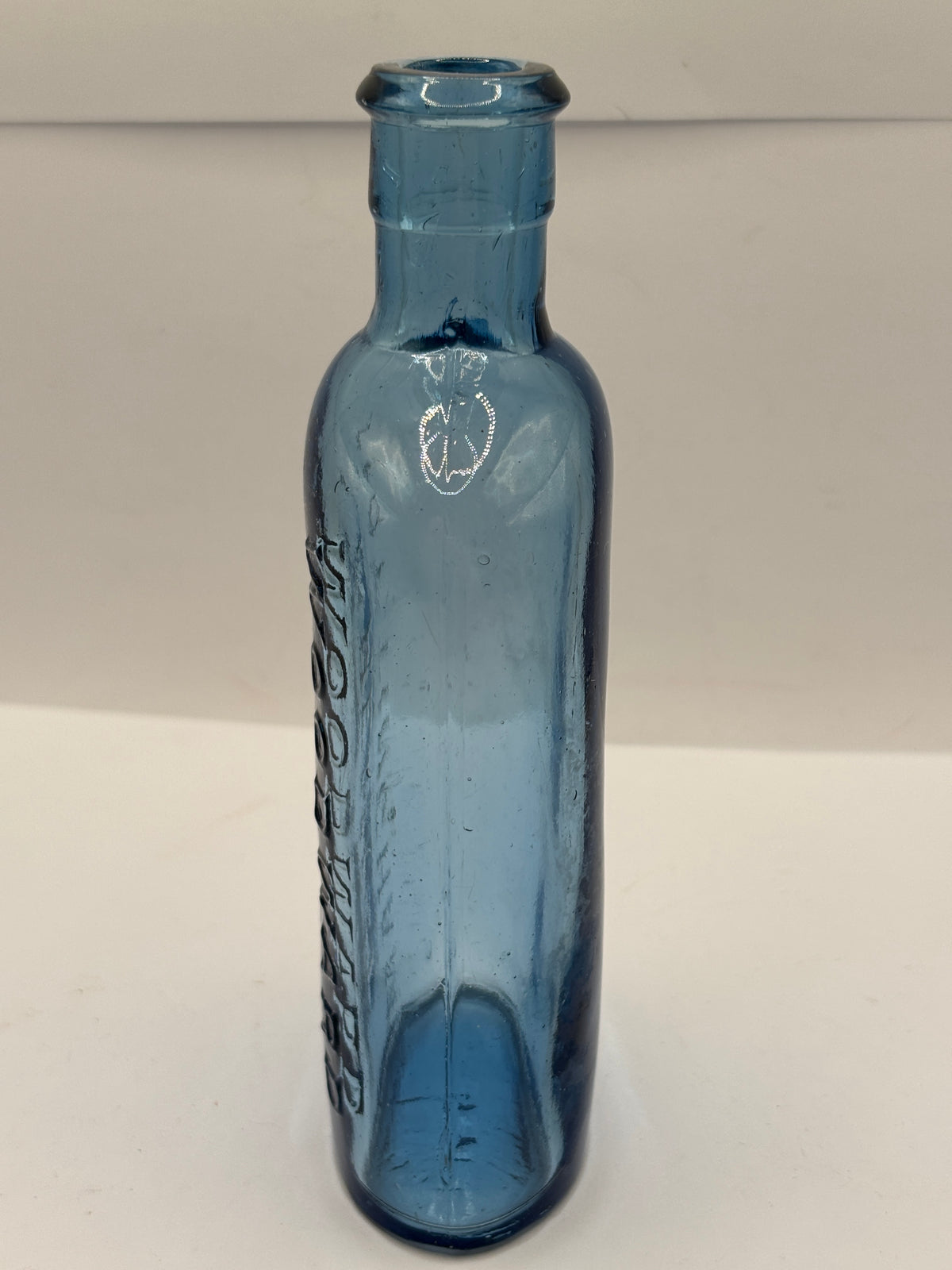 Old blue glass chemist bottle, Woodwards chemist Nottingham