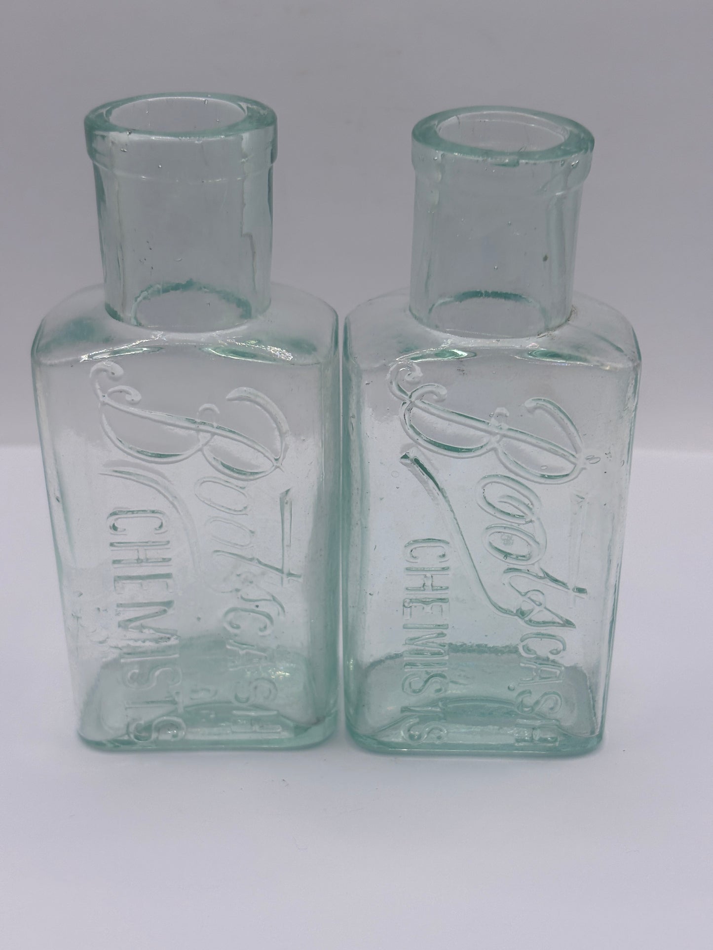 2 Old glass Boots cash chemists bottles