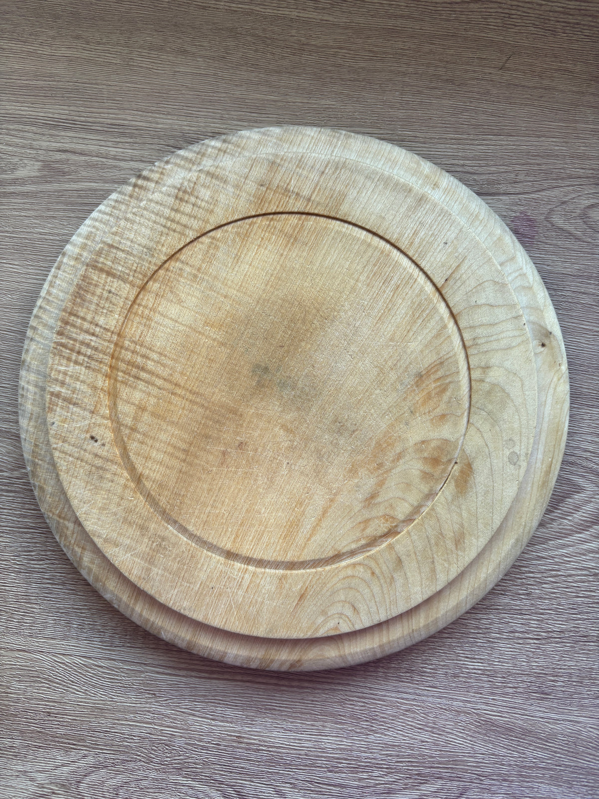 Old wooden carved bread board