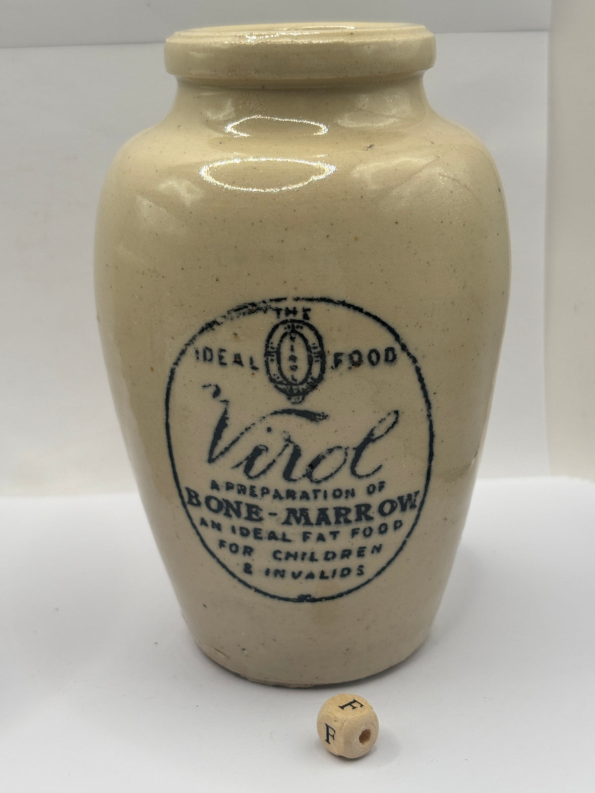 Old advertising stoneware Virol pot, 13.5cms (F)