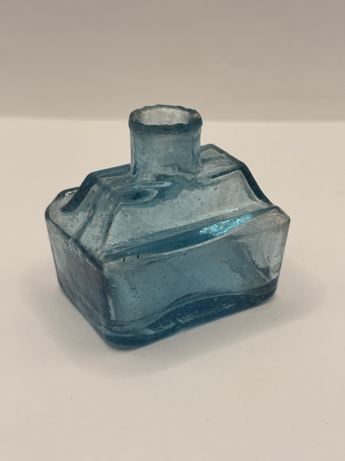 Old blue glass inkwell, ink bottle, penny ink. Boat ink