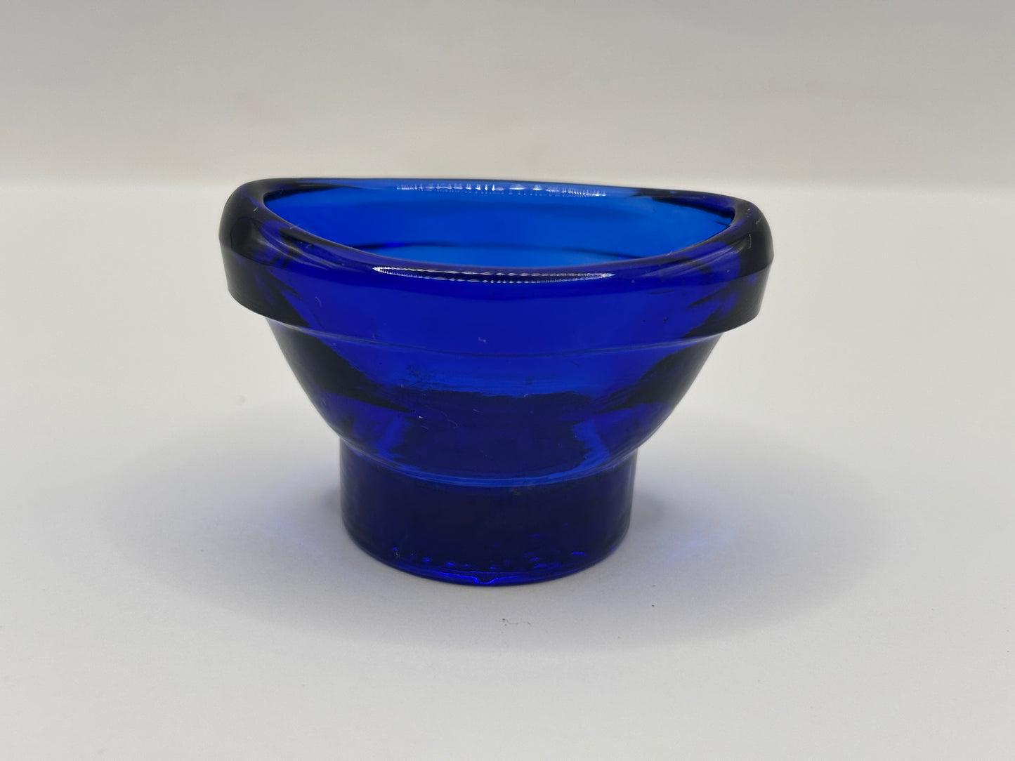 Old blue glass eye bath, eye wash