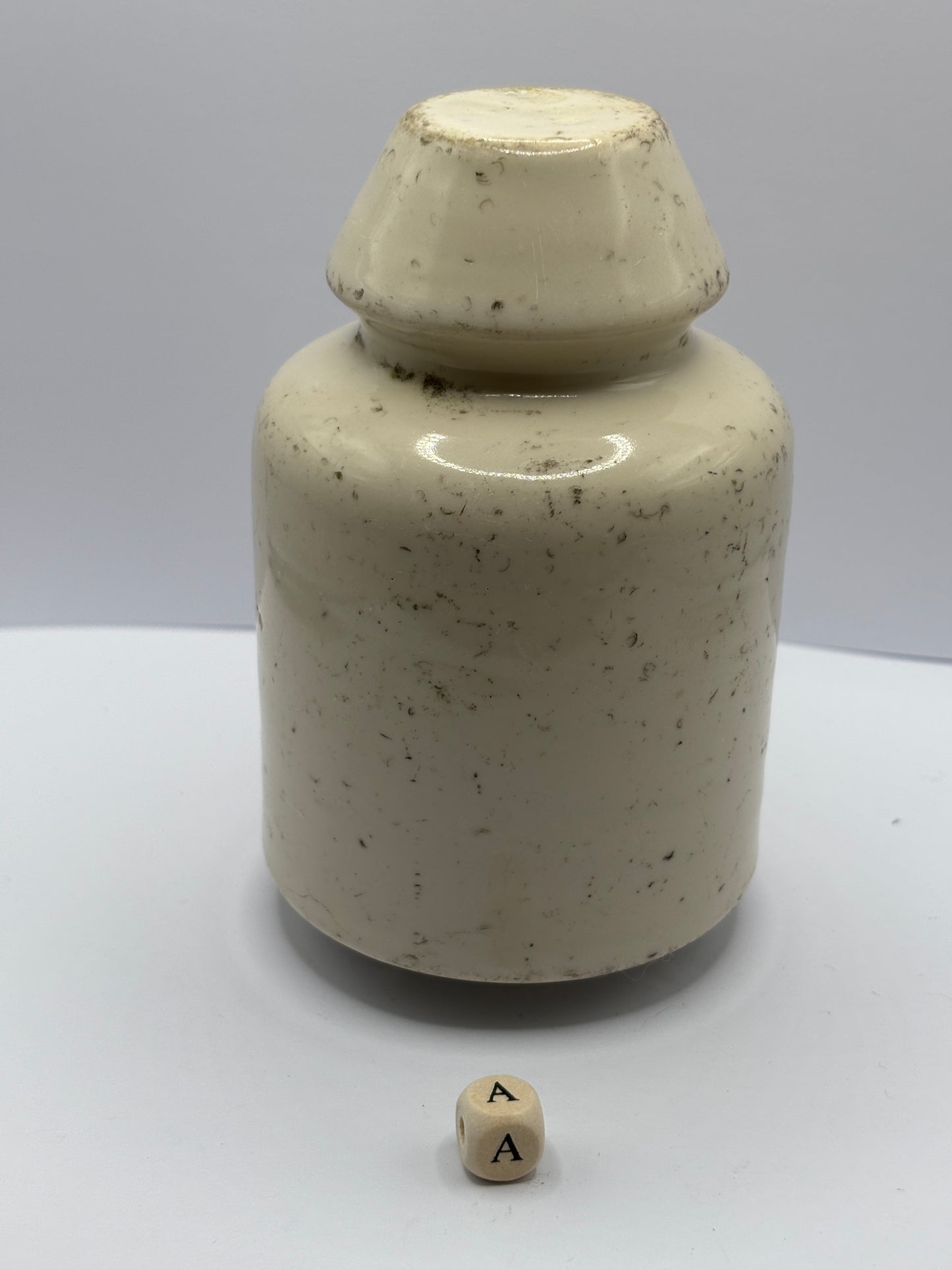 Old stoneware telegraph pole insulator (a)