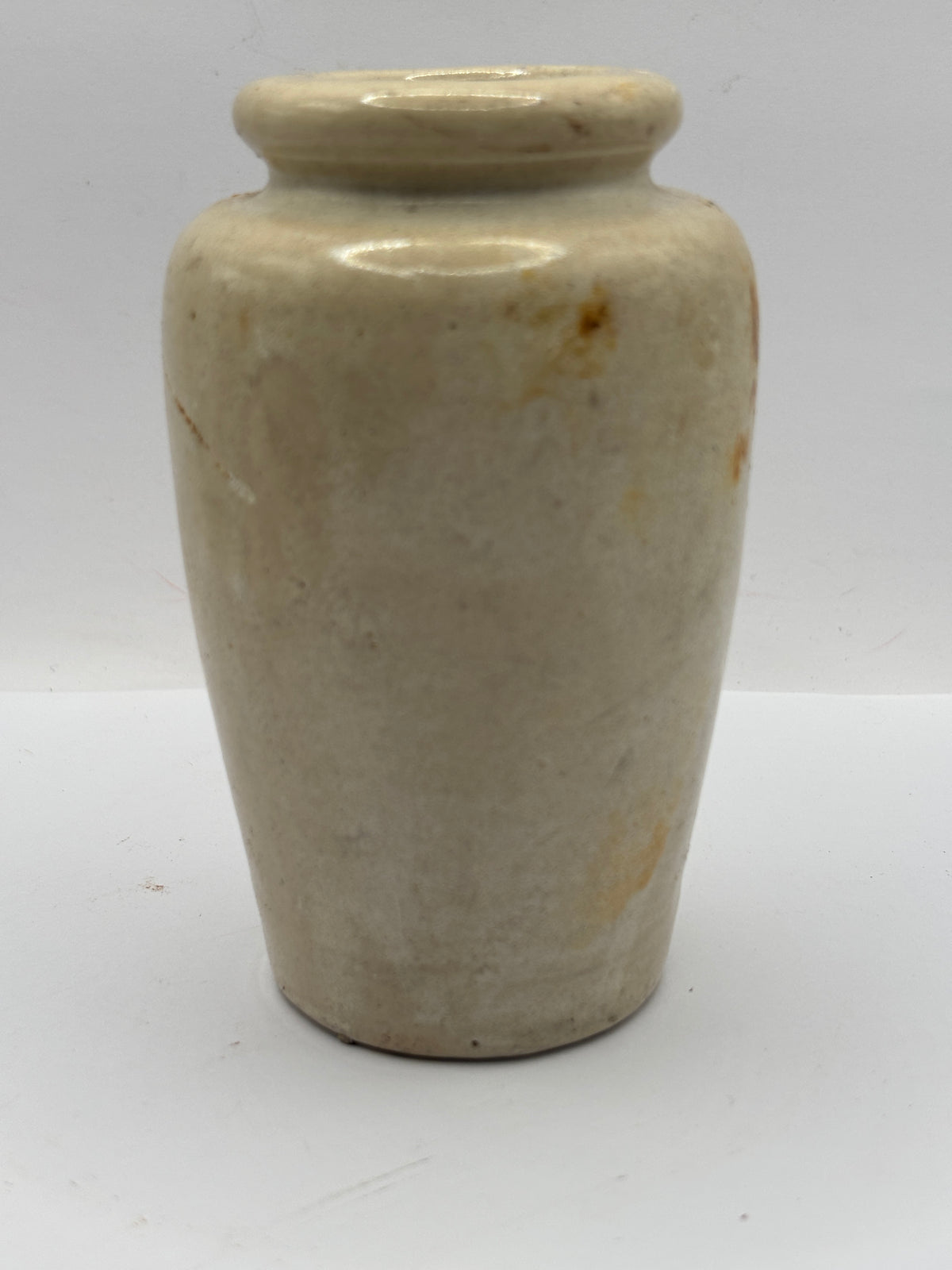 Old stained stoneware cream pot
