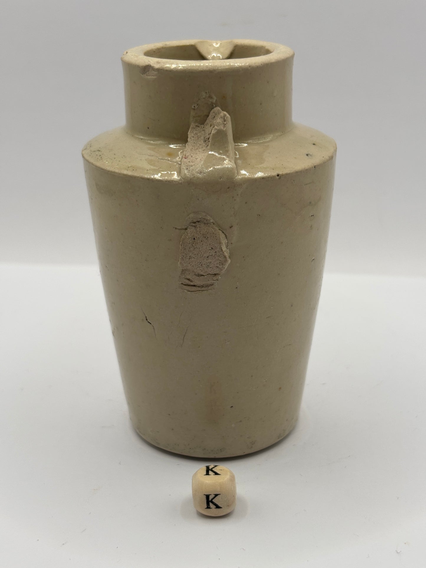 Old stoneware advertising cream pot. Provencial dairies Leeds (k) damaged