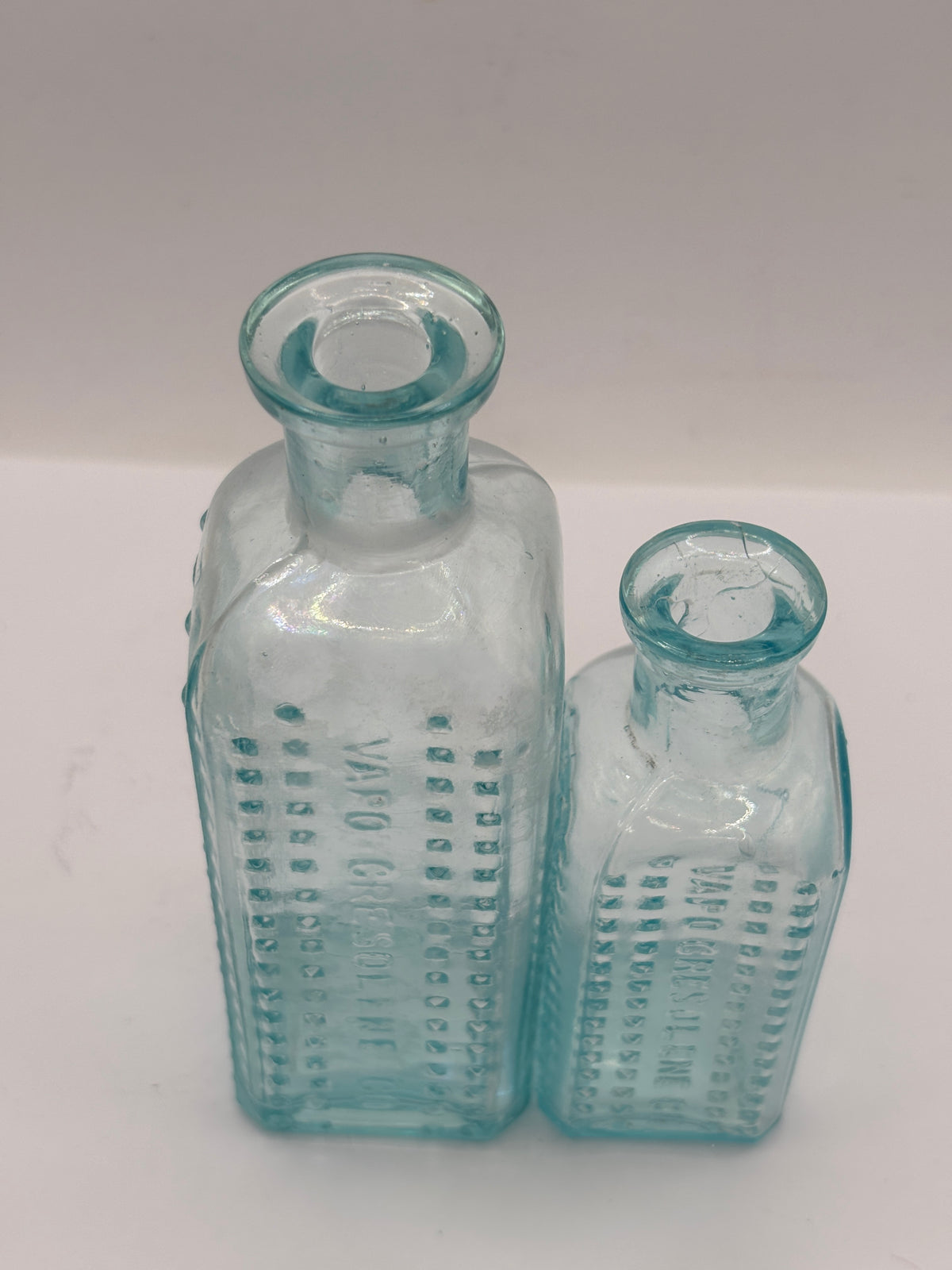 2 aqua glass bottles, Vapo-cresolene co