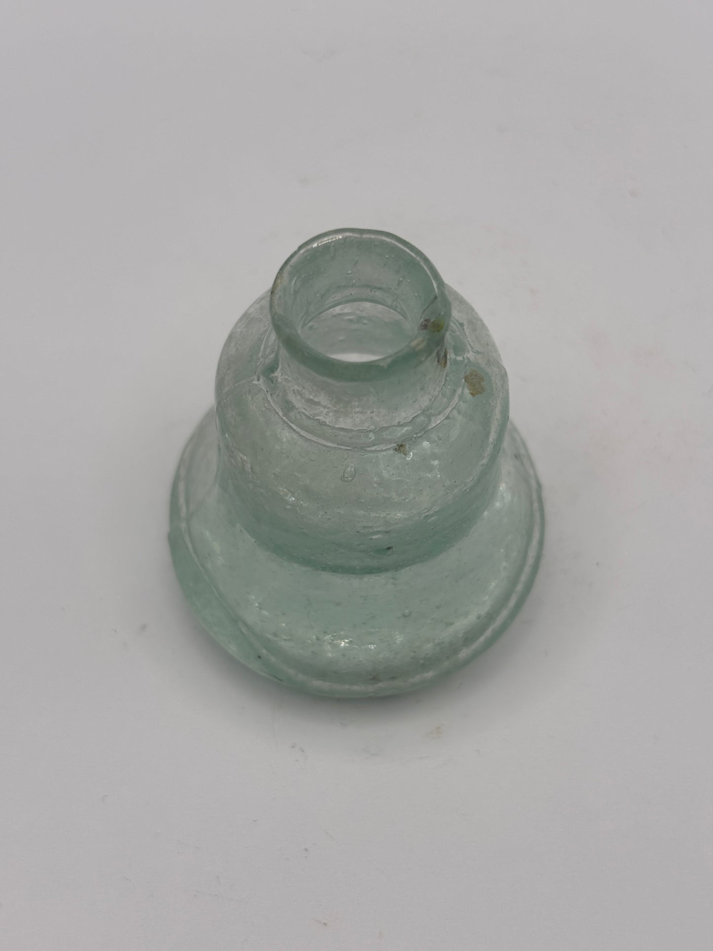 Old aqua glass inkwell, Bell ink. Ink bottle