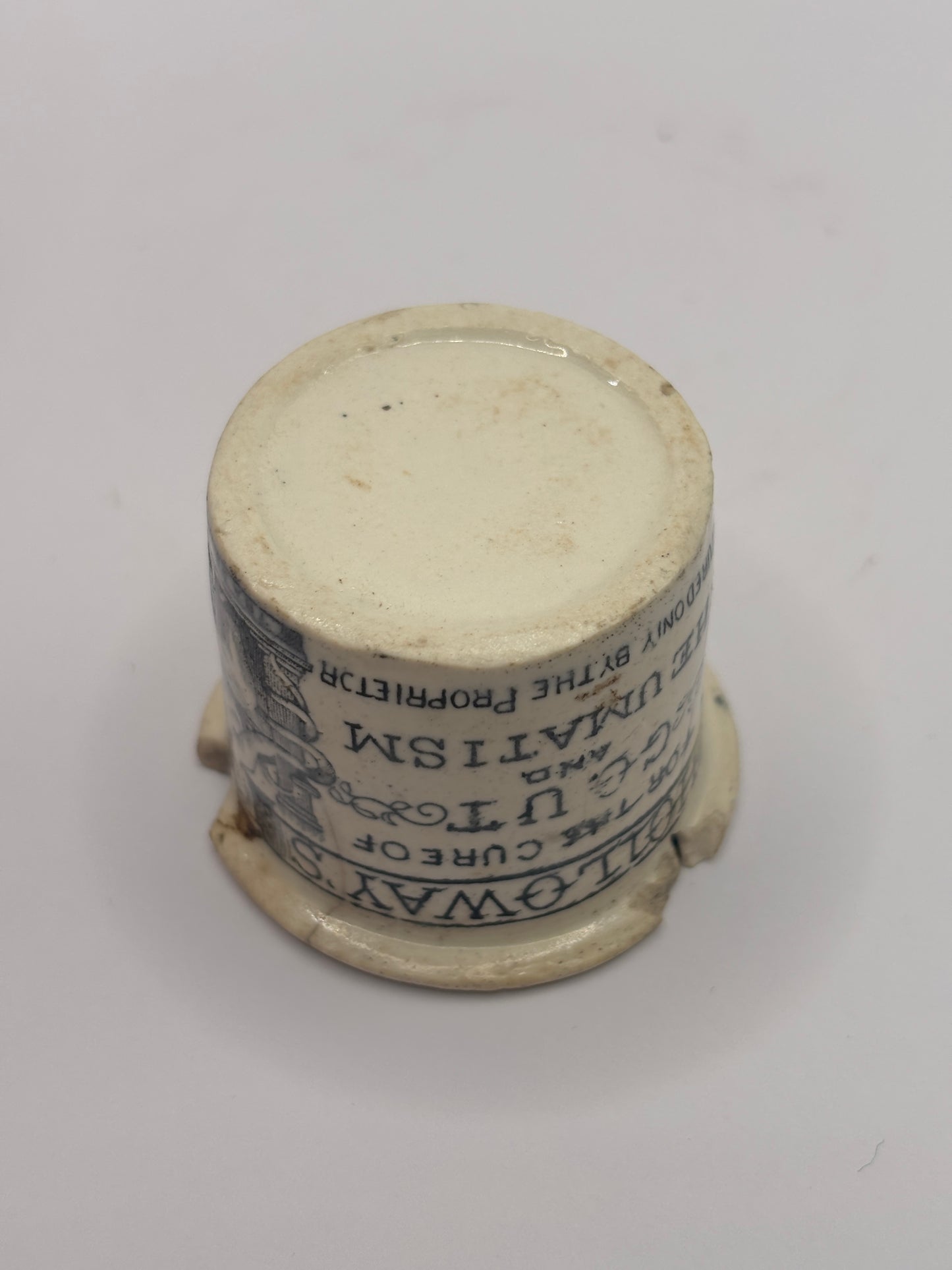 Old advertising ointment pot, Holloway’s ointment. Damaged