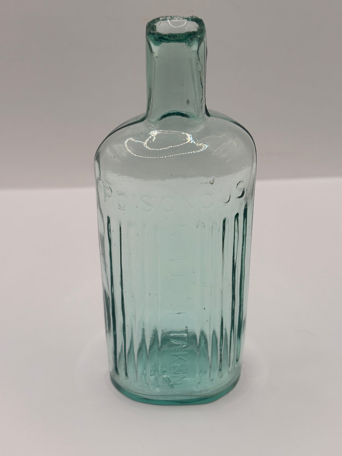 Old aqua glass poison bottle, POISONOUS Not to be taken