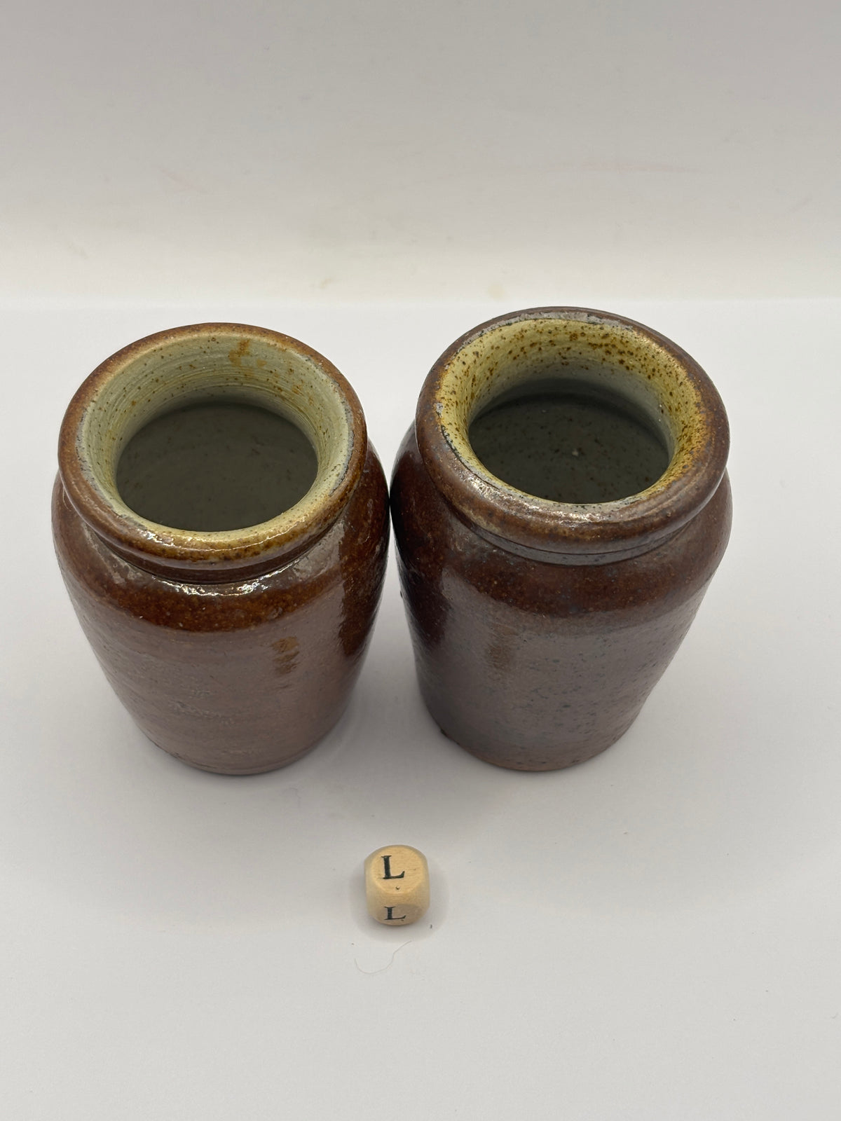2 Old brown stoneware cream pots (L)