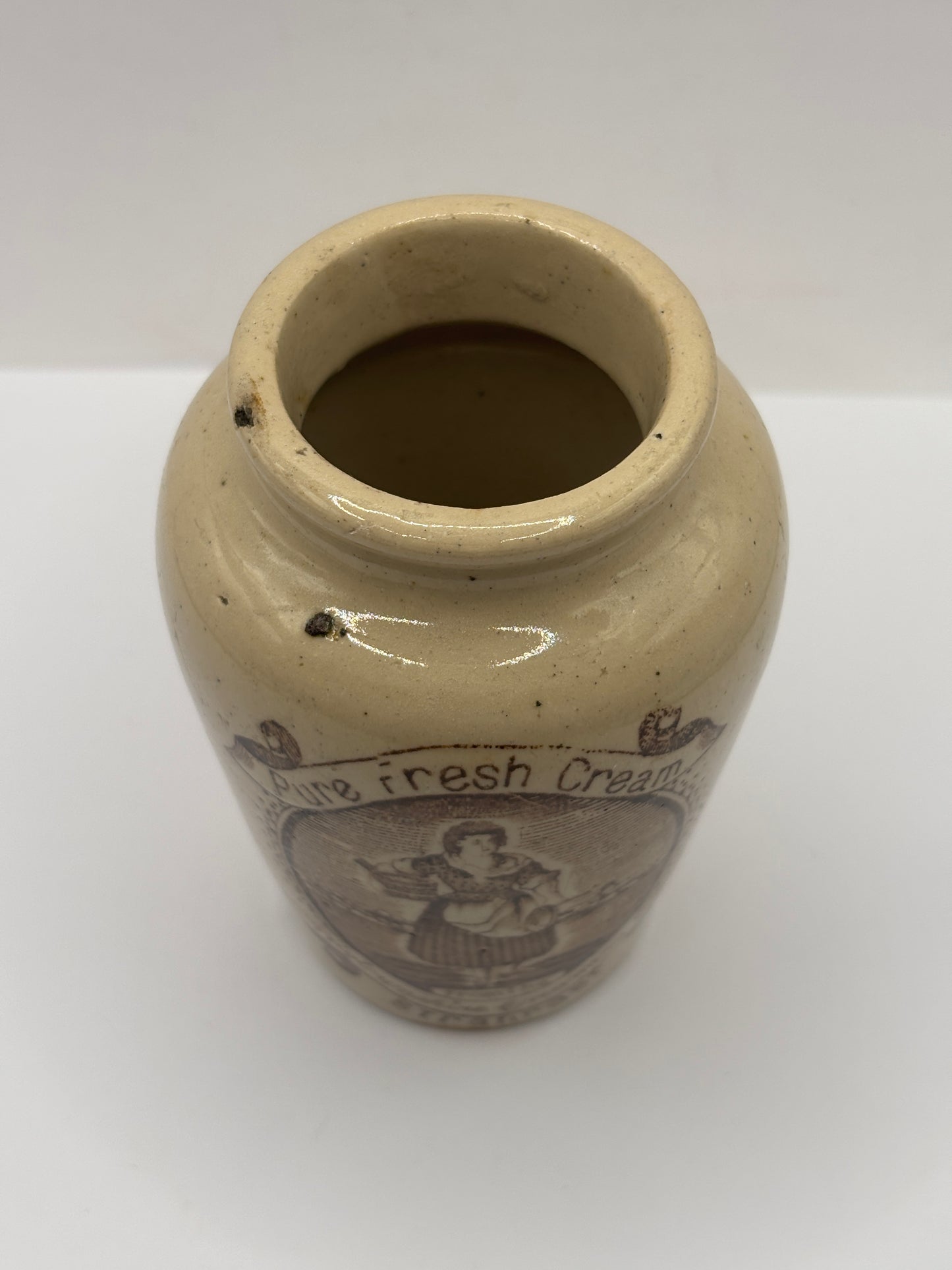 Old advertising cream pot, pure fresh cream Stranraer. Serpia print